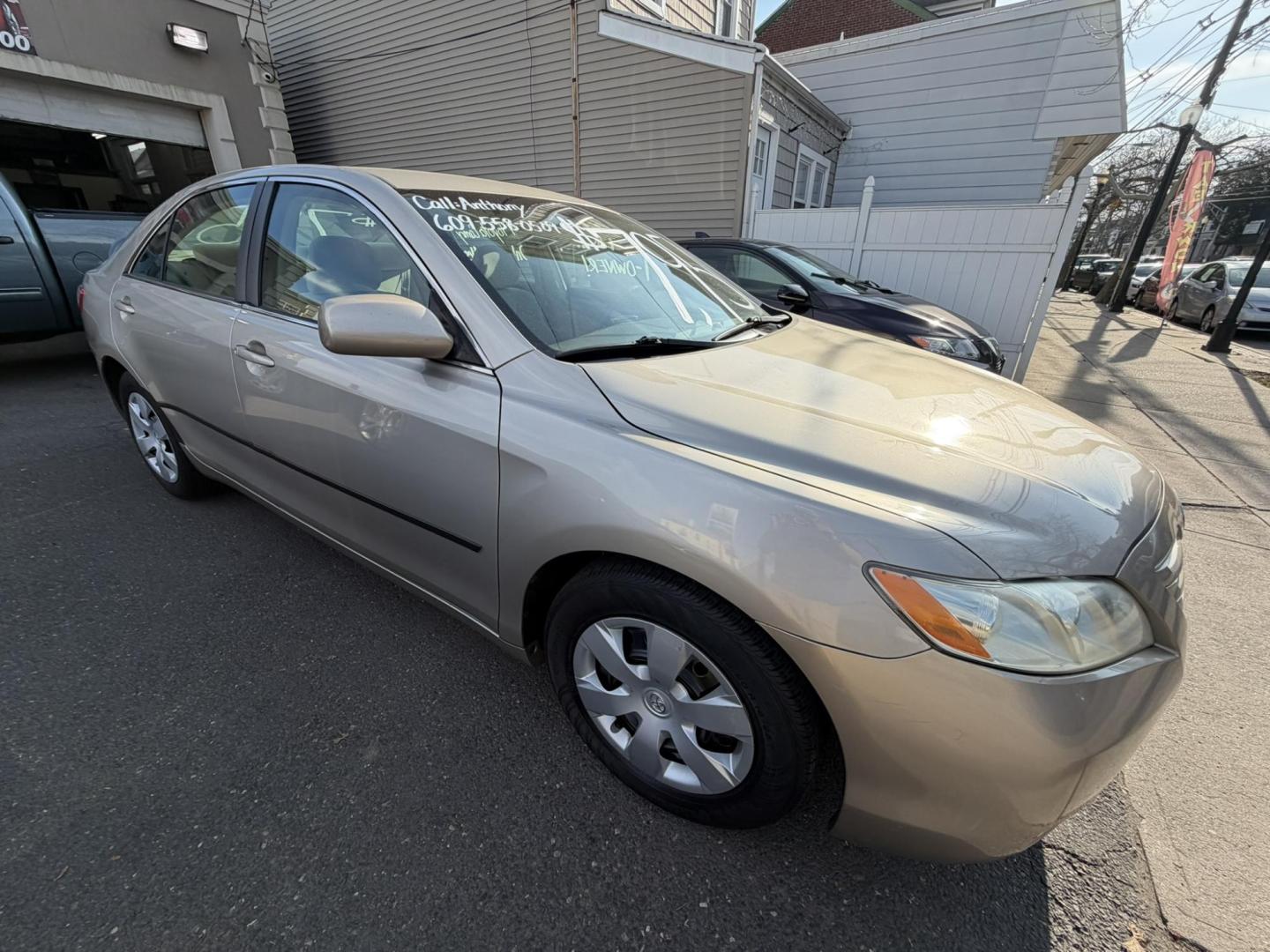 2009 Gold /beige Toyota Camry CE 5-Spd AT (4T1BE46K99U) with an 2.4L L4 DOHC 16V engine, 5-Speed Automatic Overdrive transmission, located at 1018 Brunswick Ave, Trenton, NJ, 08638, (609) 989-0900, 40.240086, -74.748085 - Here is a real nice and low mile, one owner Toyota Camry! Just serviced and detailed and ready for next ownership! Super clean and needs nothing at all, please call Anthony to set up a time to test drive,609-273-5100 - Photo#1