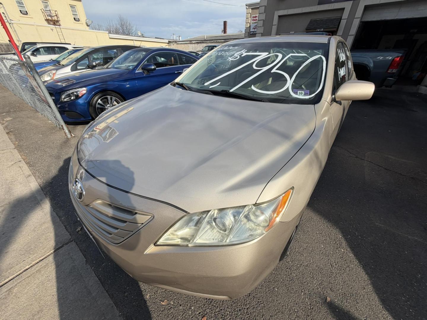 2009 Gold /beige Toyota Camry CE 5-Spd AT (4T1BE46K99U) with an 2.4L L4 DOHC 16V engine, 5-Speed Automatic Overdrive transmission, located at 1018 Brunswick Ave, Trenton, NJ, 08638, (609) 989-0900, 40.240086, -74.748085 - Here is a real nice and low mile, one owner Toyota Camry! Just serviced and detailed and ready for next ownership! Super clean and needs nothing at all, please call Anthony to set up a time to test drive,609-273-5100 - Photo#2