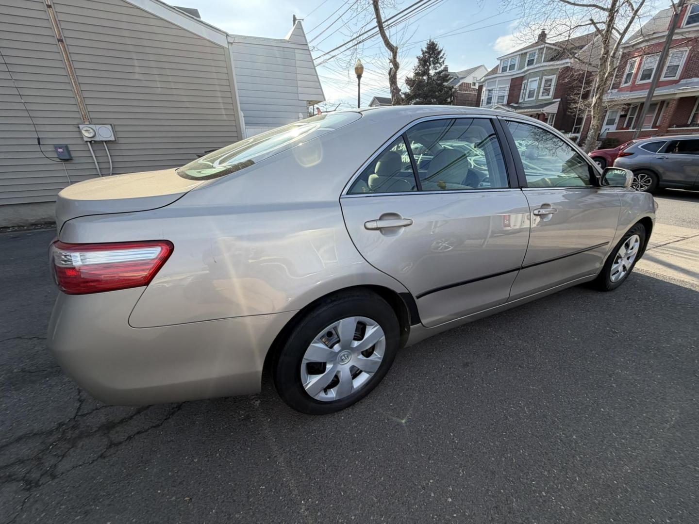 2009 Gold /beige Toyota Camry CE 5-Spd AT (4T1BE46K99U) with an 2.4L L4 DOHC 16V engine, 5-Speed Automatic Overdrive transmission, located at 1018 Brunswick Ave, Trenton, NJ, 08638, (609) 989-0900, 40.240086, -74.748085 - Here is a real nice and low mile, one owner Toyota Camry! Just serviced and detailed and ready for next ownership! Super clean and needs nothing at all, please call Anthony to set up a time to test drive,609-273-5100 - Photo#3