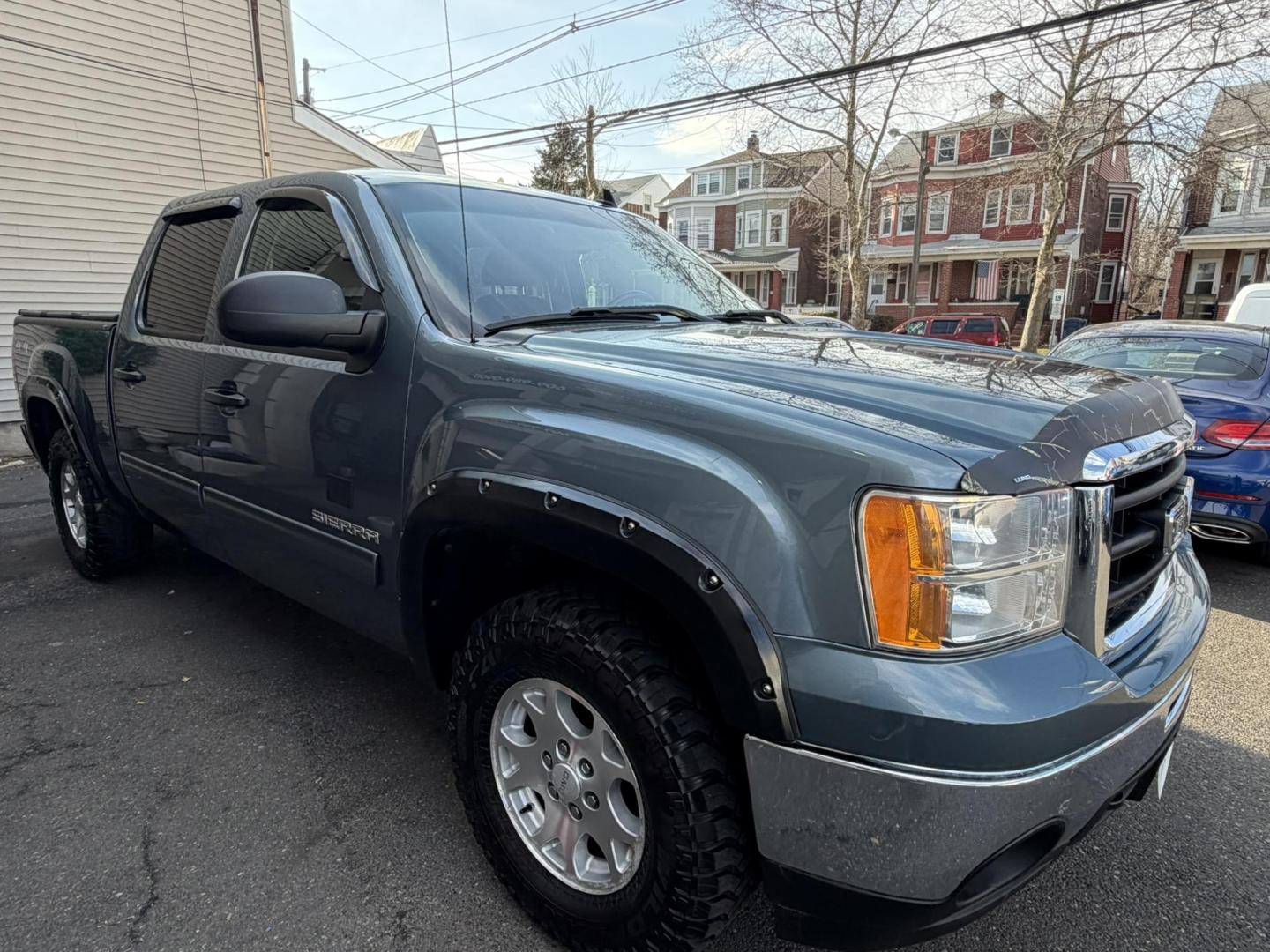 2011 BLUE /Black GMC Sierra 1500 SLE Crew Cab 4WD (3GTP2VE39BG) with an 5.3L V8 OHV 16V FFV engine, 4-Speed Automatic transmission, located at 1018 Brunswick Ave, Trenton, NJ, 08638, (609) 989-0900, 40.240086, -74.748085 - Photo#1