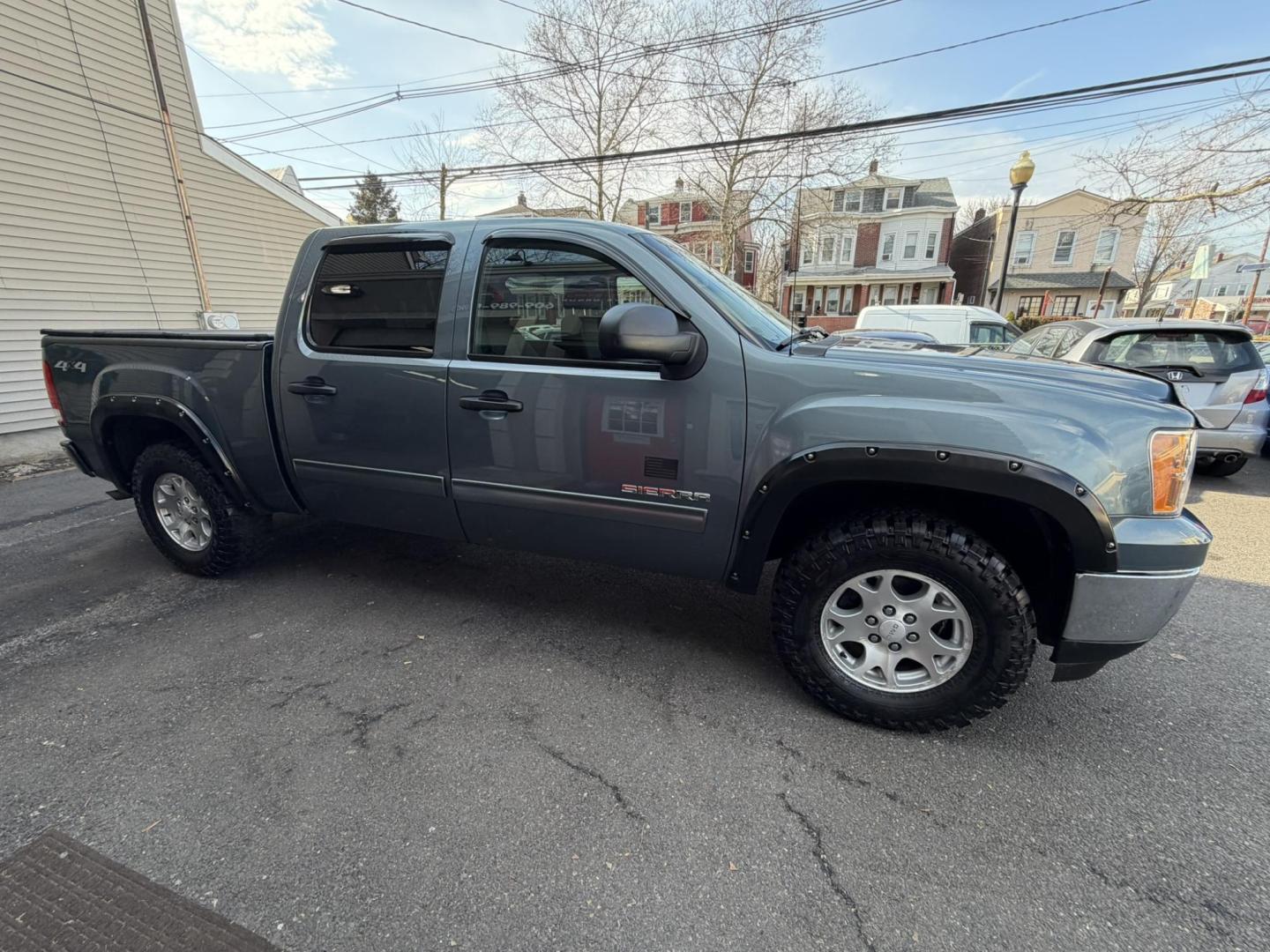 2011 BLUE /Black GMC Sierra 1500 SLE Crew Cab 4WD (3GTP2VE39BG) with an 5.3L V8 OHV 16V FFV engine, 4-Speed Automatic transmission, located at 1018 Brunswick Ave, Trenton, NJ, 08638, (609) 989-0900, 40.240086, -74.748085 - Here is a super clean GMC Sierra crew cab! Just serviced and detailed to perfection and a must see and drive ASAP! Call Anthony to set up an appointment as this Truck will not last long! 609-273-5100 - Photo#7