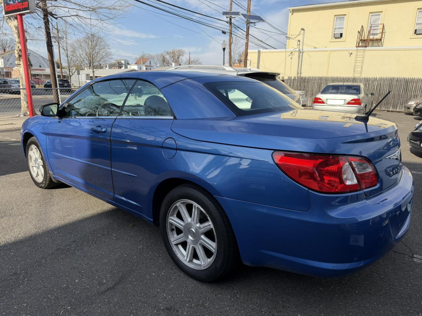 2008 BLUE /Gray Leather Chrysler Sebring Convertible Touring (1C3LC55R78N) with an 2.7L V6 DOHC 24V FFV engine, 4-Speed Automatic Overdrive transmission, located at 1018 Brunswick Ave, Trenton, NJ, 08638, (609) 989-0900, 40.240086, -74.748085- Photo#2