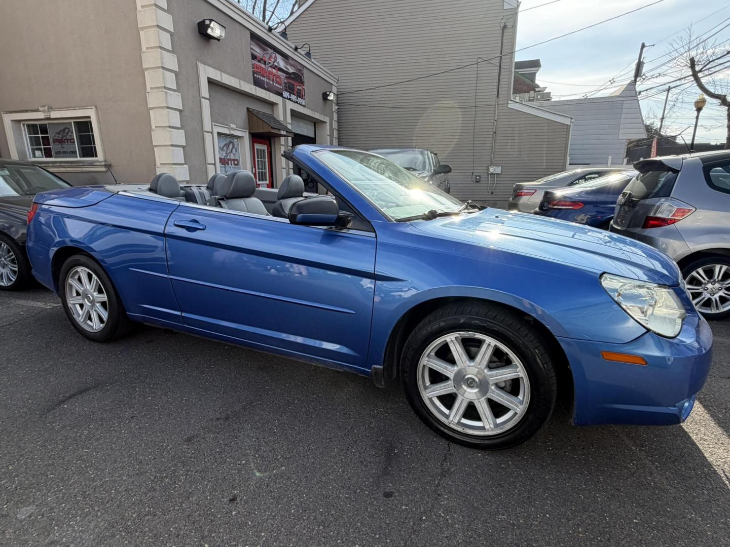 2008 BLUE /Gray Leather Chrysler Sebring Convertible Touring (1C3LC55R78N) with an 2.7L V6 DOHC 24V FFV engine, 4-Speed Automatic Overdrive transmission, located at 1018 Brunswick Ave, Trenton, NJ, 08638, (609) 989-0900, 40.240086, -74.748085- Photo#0