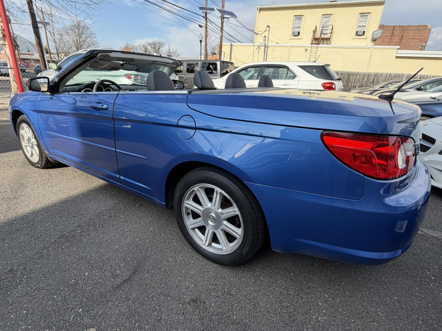 2008 BLUE /Gray Leather Chrysler Sebring Convertible Touring (1C3LC55R78N) with an 2.7L V6 DOHC 24V FFV engine, 4-Speed Automatic Overdrive transmission, located at 1018 Brunswick Ave, Trenton, NJ, 08638, (609) 989-0900, 40.240086, -74.748085- Photo#5