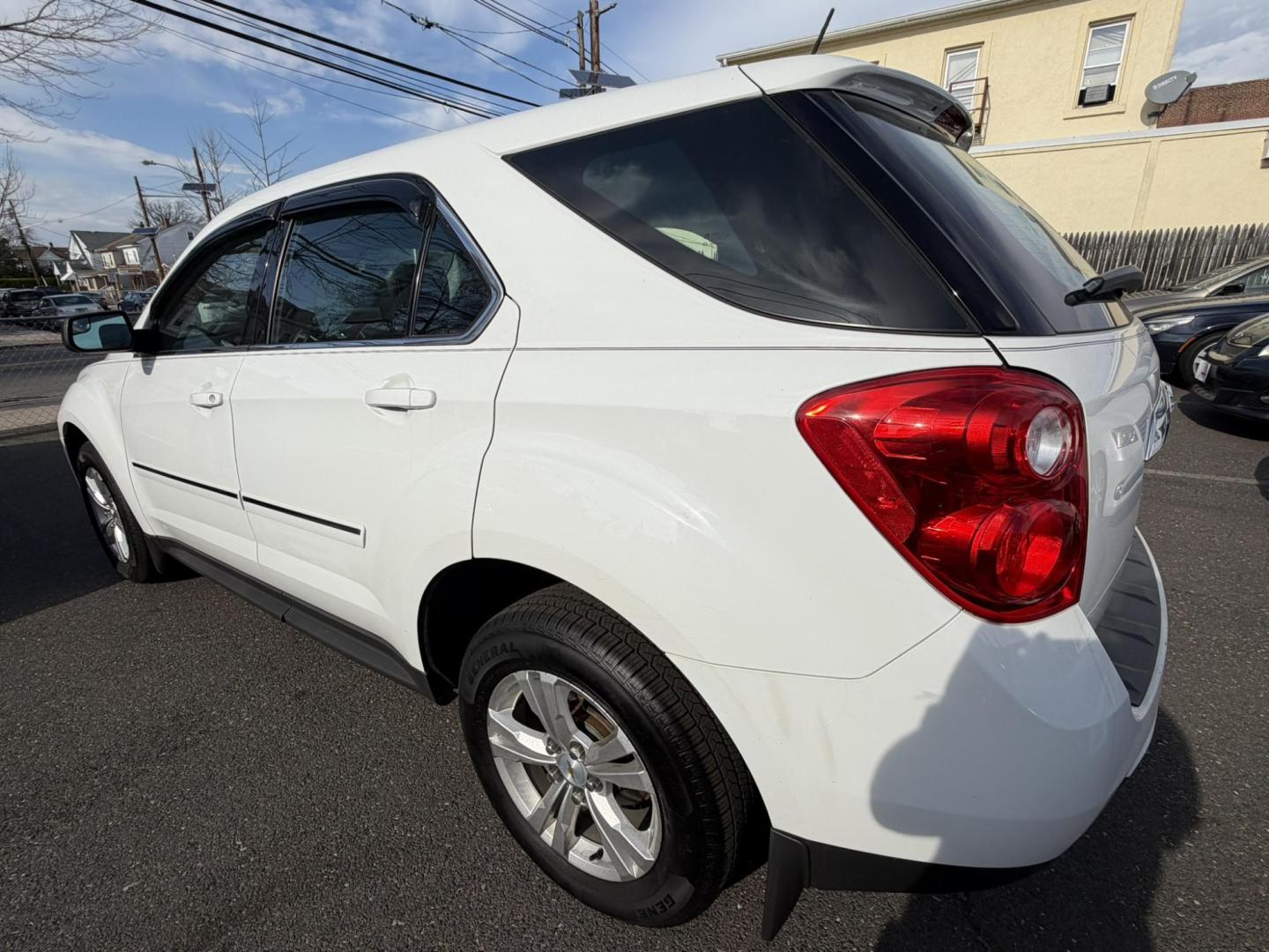 2014 White /Black/gray Chevrolet Equinox LS 2WD (2GNALAEK3E1) with an 2.4L L4 DOHC 16V FFV engine, 6-Speed Automatic transmission, located at 1018 Brunswick Ave, Trenton, NJ, 08638, (609) 989-0900, 40.240086, -74.748085 - Here is a very clean Chevy Equinox that has been serviced up and detailed to perfection and ready for new ownership! Loaded up with leather interior and alloy wheels. Financing Available!! - Photo#5