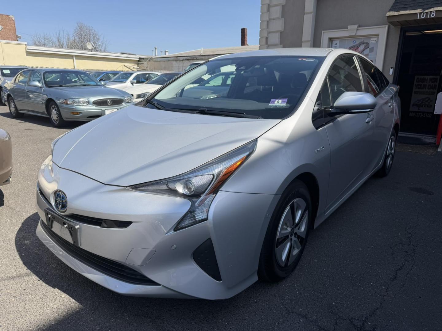 2017 SILVER /Black/gray Toyota Prius Two Eco (JTDKARFU7H3) with an 1.8L L4 DOHC 16V HYBRID engine, CVT transmission, located at 1018 Brunswick Ave, Trenton, NJ, 08638, (609) 989-0900, 40.240086, -74.748085 - Gas prices have escalated in the area so what other vehicle to drive than a hybrid prius that gets 53mpg? This one owner gem has been dealer serviced since new and ready to go! A must see and drive to appreciate, please call Anthony to set up an appt. to inquire about this super clean Toyota. 609-27 - Photo#2