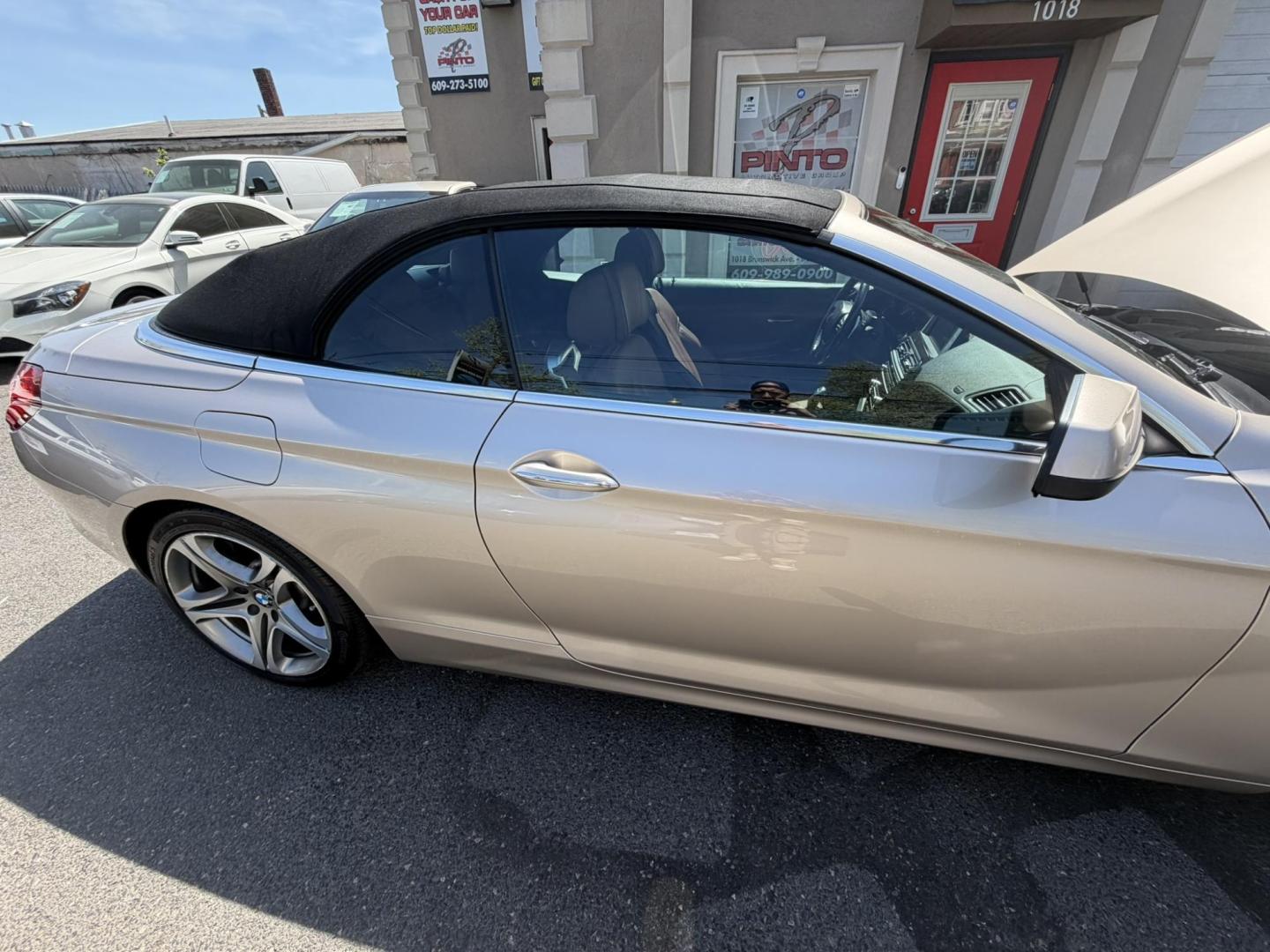 2012 Gold /Tan Leather BMW 6-Series 650i Convertible (WBALZ5C54CC) with an 4.4L V8 DOHC 32V TURBO engine, 6-Speed Manual transmission, located at 1018 Brunswick Ave, Trenton, NJ, 08638, (609) 989-0900, 40.240086, -74.748085 - Convertible season is here! This car is ready for the sun and ready for someone to own this beauty! Regularly maintained throughout its time, this vehicle will go the distance! If you are looking for a second car or summer toy, this BMW 650i is perfect for the price! Please call Anthony to set up a - Photo#6