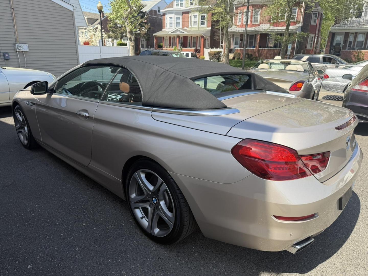 2012 Gold /Tan Leather BMW 6-Series 650i Convertible (WBALZ5C54CC) with an 4.4L V8 DOHC 32V TURBO engine, 6-Speed Manual transmission, located at 1018 Brunswick Ave, Trenton, NJ, 08638, (609) 989-0900, 40.240086, -74.748085 - Convertible season is here! This car is ready for the sun and ready for someone to own this beauty! Regularly maintained throughout its time, this vehicle will go the distance! If you are looking for a second car or summer toy, this BMW 650i is perfect for the price! Please call Anthony to set up a - Photo#4