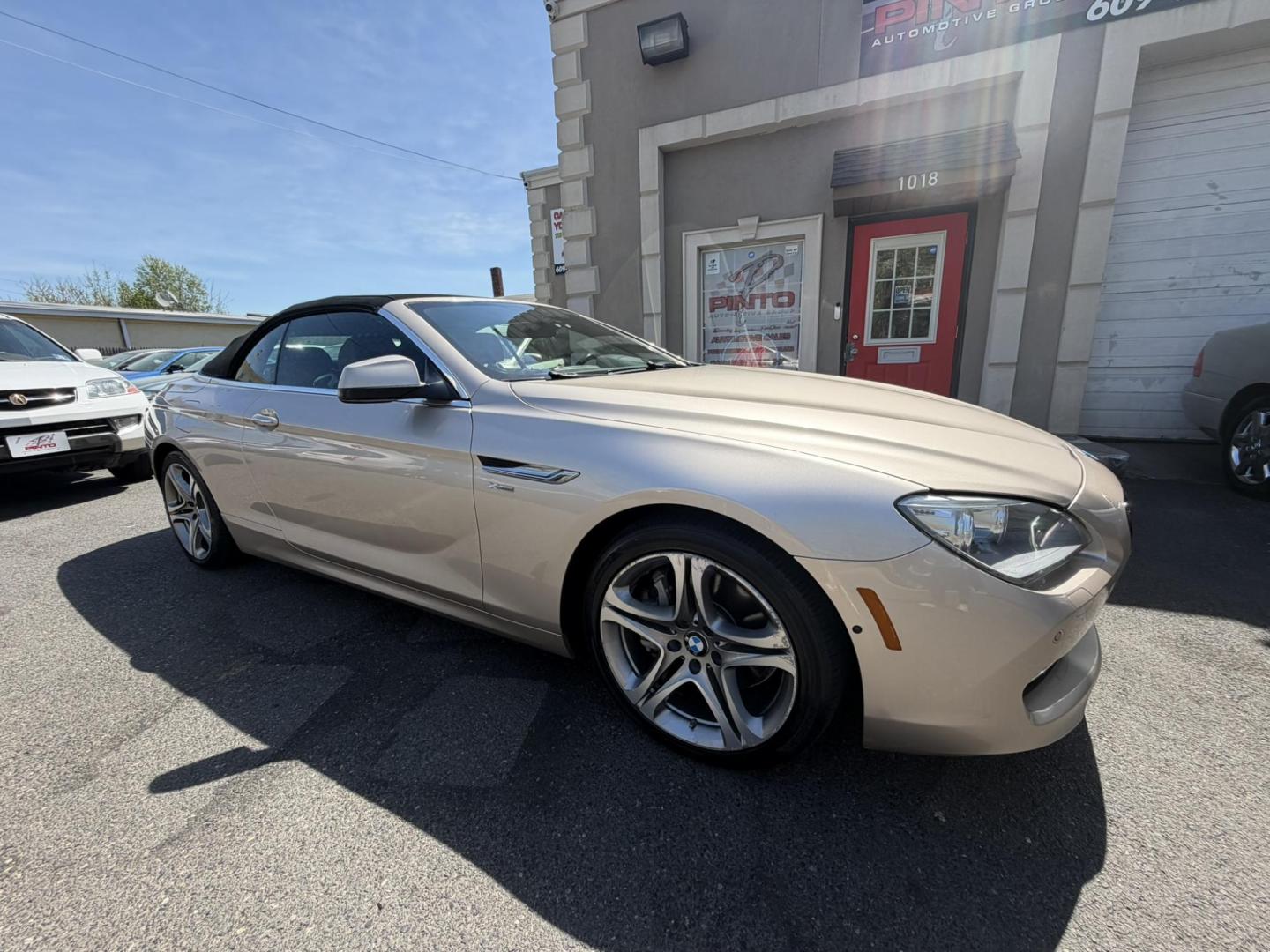 2012 Gold /Tan Leather BMW 6-Series 650i Convertible (WBALZ5C54CC) with an 4.4L V8 DOHC 32V TURBO engine, 6-Speed Manual transmission, located at 1018 Brunswick Ave, Trenton, NJ, 08638, (609) 989-0900, 40.240086, -74.748085 - Convertible season is here! This car is ready for the sun and ready for someone to own this beauty! Regularly maintained throughout its time, this vehicle will go the distance! If you are looking for a second car or summer toy, this BMW 650i is perfect for the price! Please call Anthony to set up a - Photo#3