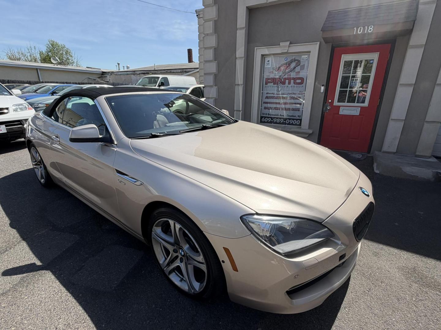 2012 Gold /Tan Leather BMW 6-Series 650i Convertible (WBALZ5C54CC) with an 4.4L V8 DOHC 32V TURBO engine, 6-Speed Manual transmission, located at 1018 Brunswick Ave, Trenton, NJ, 08638, (609) 989-0900, 40.240086, -74.748085 - Convertible season is here! This car is ready for the sun and ready for someone to own this beauty! Regularly maintained throughout its time, this vehicle will go the distance! If you are looking for a second car or summer toy, this BMW 650i is perfect for the price! Please call Anthony to set up a - Photo#5