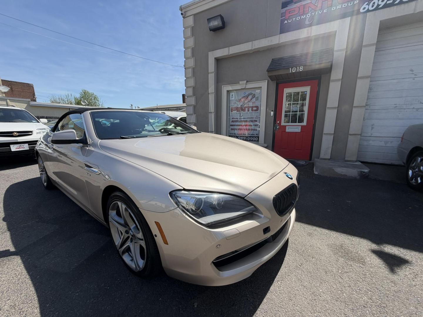 2012 Gold /Tan Leather BMW 6-Series 650i Convertible (WBALZ5C54CC) with an 4.4L V8 DOHC 32V TURBO engine, 6-Speed Manual transmission, located at 1018 Brunswick Ave, Trenton, NJ, 08638, (609) 989-0900, 40.240086, -74.748085 - Convertible season is here! This car is ready for the sun and ready for someone to own this beauty! Regularly maintained throughout its time, this vehicle will go the distance! If you are looking for a second car or summer toy, this BMW 650i is perfect for the price! Please call Anthony to set up a - Photo#1