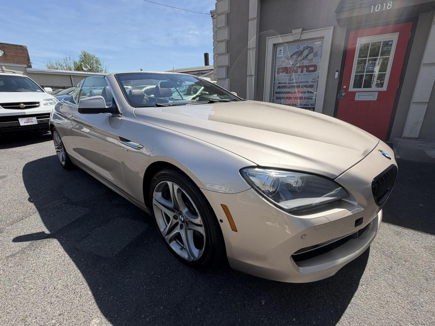 2012 Gold /Tan Leather BMW 6-Series 650i Convertible (WBALZ5C54CC) with an 4.4L V8 DOHC 32V TURBO engine, 6-Speed Manual transmission, located at 1018 Brunswick Ave, Trenton, NJ, 08638, (609) 989-0900, 40.240086, -74.748085 - Convertible season is here! This car is ready for the sun and ready for someone to own this beauty! Regularly maintained throughout its time, this vehicle will go the distance! If you are looking for a second car or summer toy, this BMW 650i is perfect for the price! Please call Anthony to set up a - Photo#7