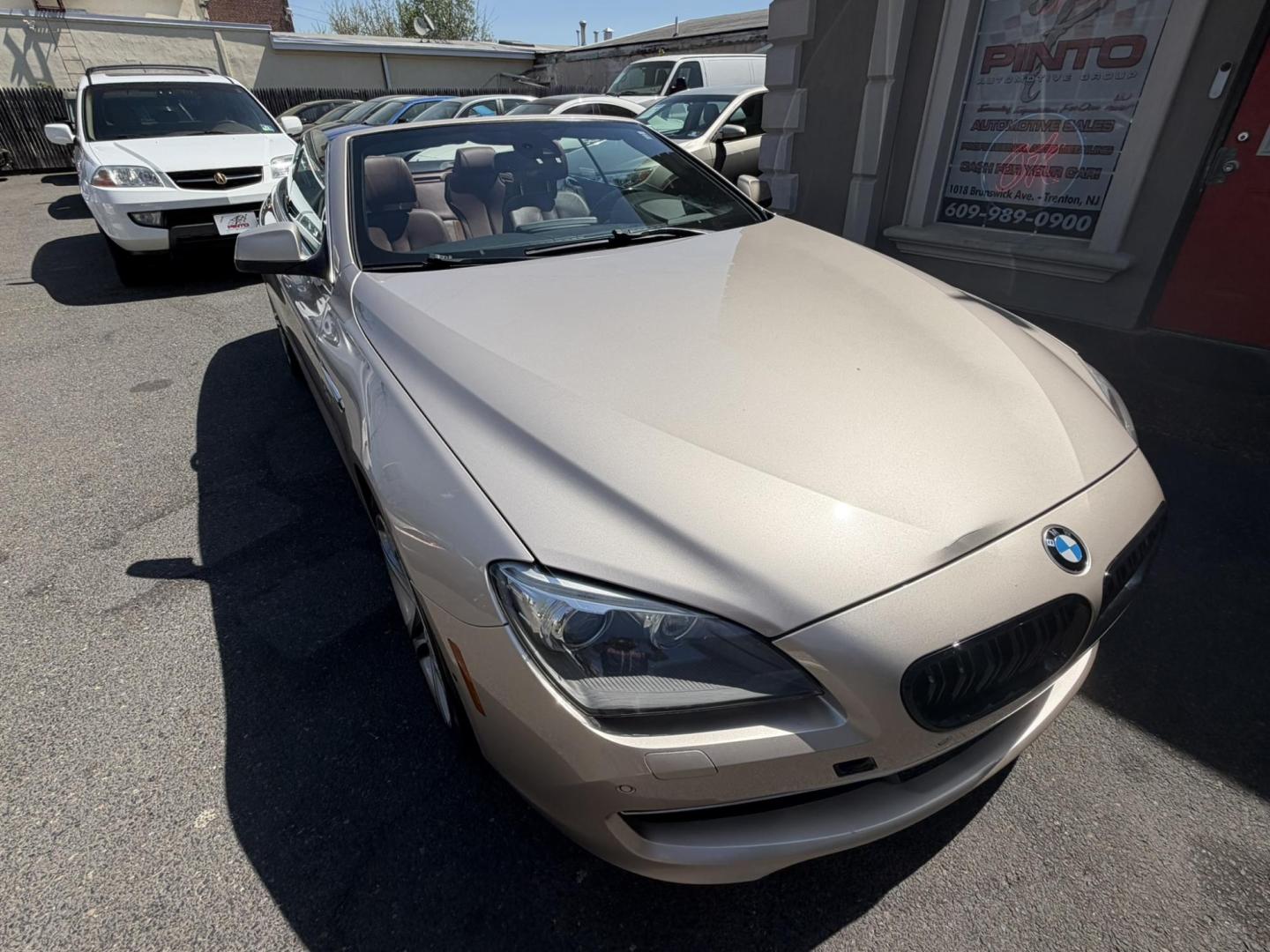 2012 Gold /Tan Leather BMW 6-Series 650i Convertible (WBALZ5C54CC) with an 4.4L V8 DOHC 32V TURBO engine, 6-Speed Manual transmission, located at 1018 Brunswick Ave, Trenton, NJ, 08638, (609) 989-0900, 40.240086, -74.748085 - Convertible season is here! This car is ready for the sun and ready for someone to own this beauty! Regularly maintained throughout its time, this vehicle will go the distance! If you are looking for a second car or summer toy, this BMW 650i is perfect for the price! Please call Anthony to set up a - Photo#12