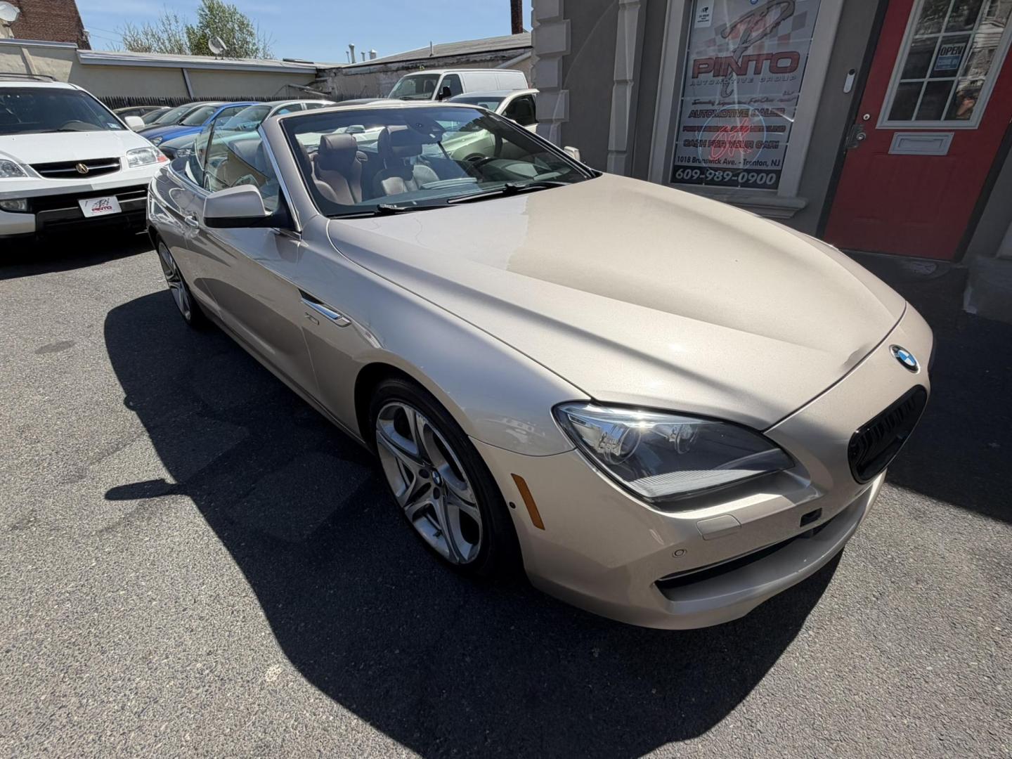 2012 Gold /Tan Leather BMW 6-Series 650i Convertible (WBALZ5C54CC) with an 4.4L V8 DOHC 32V TURBO engine, 6-Speed Manual transmission, located at 1018 Brunswick Ave, Trenton, NJ, 08638, (609) 989-0900, 40.240086, -74.748085 - Convertible season is here! This car is ready for the sun and ready for someone to own this beauty! Regularly maintained throughout its time, this vehicle will go the distance! If you are looking for a second car or summer toy, this BMW 650i is perfect for the price! Please call Anthony to set up a - Photo#13