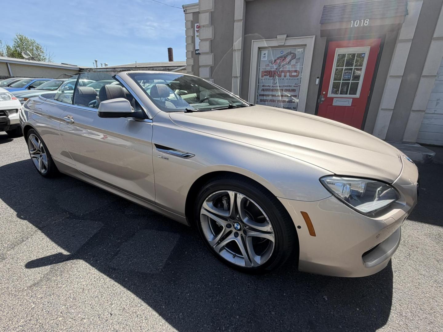 2012 Gold /Tan Leather BMW 6-Series 650i Convertible (WBALZ5C54CC) with an 4.4L V8 DOHC 32V TURBO engine, 6-Speed Manual transmission, located at 1018 Brunswick Ave, Trenton, NJ, 08638, (609) 989-0900, 40.240086, -74.748085 - Convertible season is here! This car is ready for the sun and ready for someone to own this beauty! Regularly maintained throughout its time, this vehicle will go the distance! If you are looking for a second car or summer toy, this BMW 650i is perfect for the price! Please call Anthony to set up a - Photo#0
