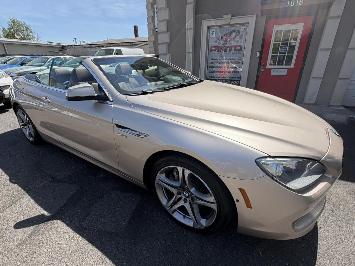 2012 Gold /Tan Leather BMW 6-Series 650i Convertible (WBALZ5C54CC) with an 4.4L V8 DOHC 32V TURBO engine, 6-Speed Manual transmission, located at 1018 Brunswick Ave, Trenton, NJ, 08638, (609) 989-0900, 40.240086, -74.748085 - Convertible season is here! This car is ready for the sun and ready for someone to own this beauty! Regularly maintained throughout its time, this vehicle will go the distance! If you are looking for a second car or summer toy, this BMW 650i is perfect for the price! Please call Anthony to set up a - Photo#14