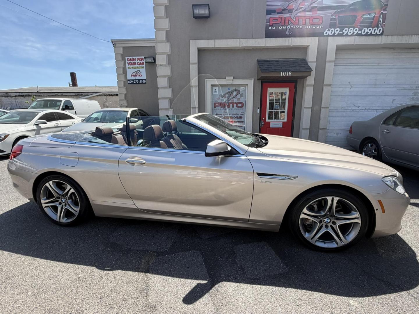 2012 Gold /Tan Leather BMW 6-Series 650i Convertible (WBALZ5C54CC) with an 4.4L V8 DOHC 32V TURBO engine, 6-Speed Manual transmission, located at 1018 Brunswick Ave, Trenton, NJ, 08638, (609) 989-0900, 40.240086, -74.748085 - Convertible season is here! This car is ready for the sun and ready for someone to own this beauty! Regularly maintained throughout its time, this vehicle will go the distance! If you are looking for a second car or summer toy, this BMW 650i is perfect for the price! Please call Anthony to set up a - Photo#11