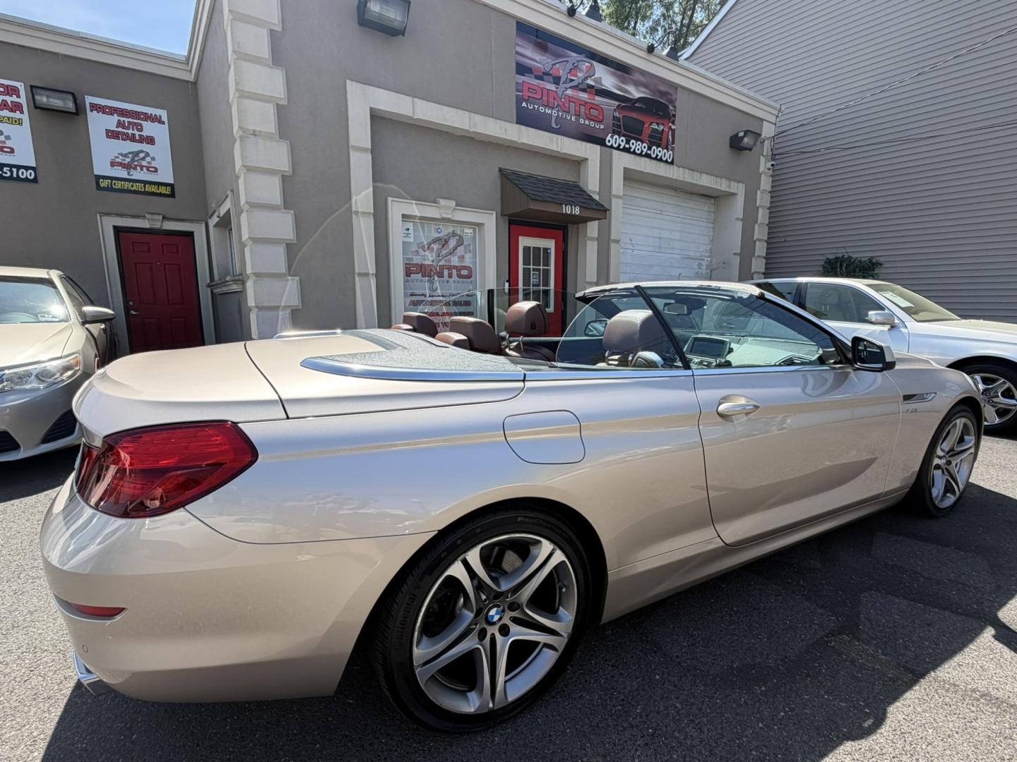 2012 Gold /Tan Leather BMW 6-Series 650i Convertible (WBALZ5C54CC) with an 4.4L V8 DOHC 32V TURBO engine, 6-Speed Manual transmission, located at 1018 Brunswick Ave, Trenton, NJ, 08638, (609) 989-0900, 40.240086, -74.748085 - Convertible season is here! This car is ready for the sun and ready for someone to own this beauty! Regularly maintained throughout its time, this vehicle will go the distance! If you are looking for a second car or summer toy, this BMW 650i is perfect for the price! Please call Anthony to set up a - Photo#15