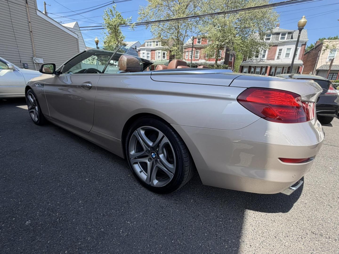 2012 Gold /Tan Leather BMW 6-Series 650i Convertible (WBALZ5C54CC) with an 4.4L V8 DOHC 32V TURBO engine, 6-Speed Manual transmission, located at 1018 Brunswick Ave, Trenton, NJ, 08638, (609) 989-0900, 40.240086, -74.748085 - Convertible season is here! This car is ready for the sun and ready for someone to own this beauty! Regularly maintained throughout its time, this vehicle will go the distance! If you are looking for a second car or summer toy, this BMW 650i is perfect for the price! Please call Anthony to set up a - Photo#19