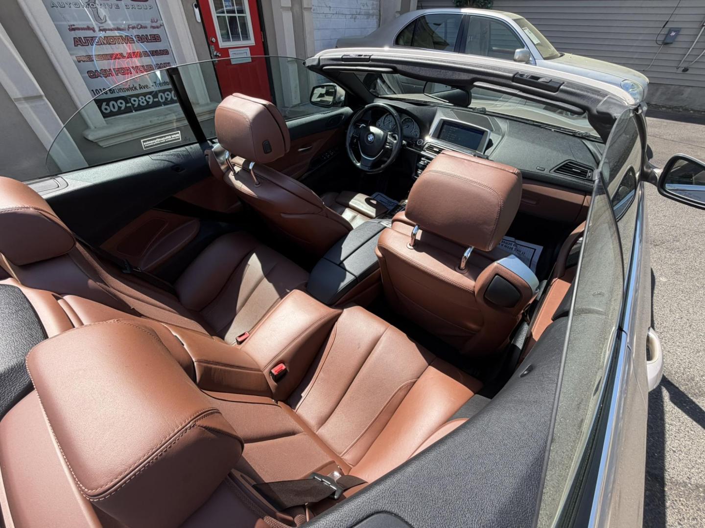 2012 Gold /Tan Leather BMW 6-Series 650i Convertible (WBALZ5C54CC) with an 4.4L V8 DOHC 32V TURBO engine, 6-Speed Manual transmission, located at 1018 Brunswick Ave, Trenton, NJ, 08638, (609) 989-0900, 40.240086, -74.748085 - Convertible season is here! This car is ready for the sun and ready for someone to own this beauty! Regularly maintained throughout its time, this vehicle will go the distance! If you are looking for a second car or summer toy, this BMW 650i is perfect for the price! Please call Anthony to set up a - Photo#23