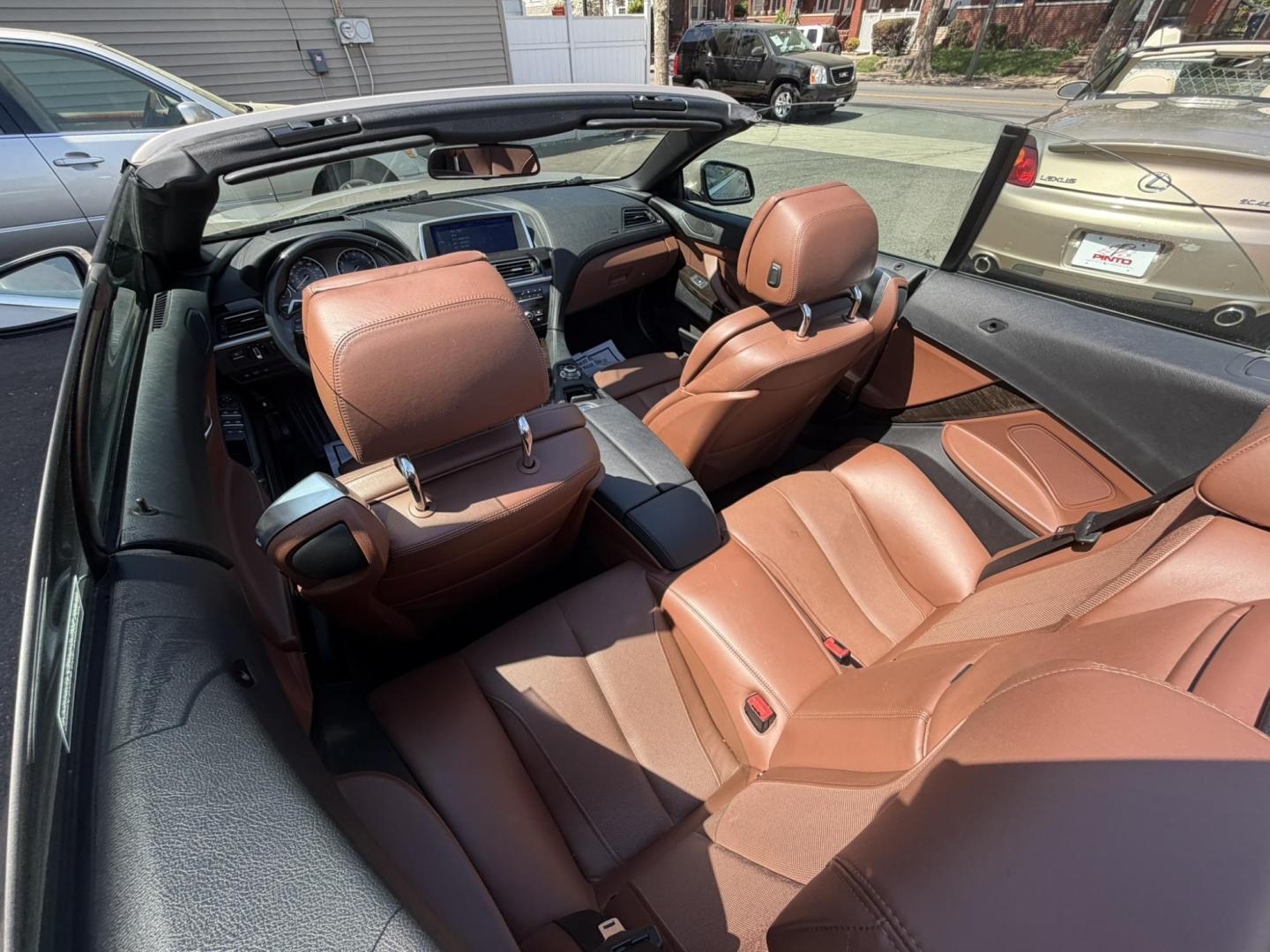 2012 Gold /Tan Leather BMW 6-Series 650i Convertible (WBALZ5C54CC) with an 4.4L V8 DOHC 32V TURBO engine, 6-Speed Manual transmission, located at 1018 Brunswick Ave, Trenton, NJ, 08638, (609) 989-0900, 40.240086, -74.748085 - Convertible season is here! This car is ready for the sun and ready for someone to own this beauty! Regularly maintained throughout its time, this vehicle will go the distance! If you are looking for a second car or summer toy, this BMW 650i is perfect for the price! Please call Anthony to set up a - Photo#25