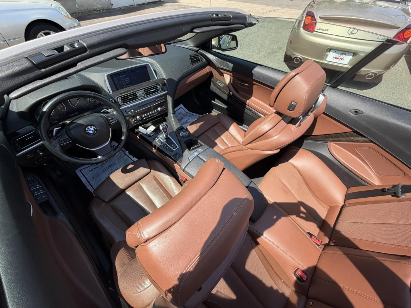 2012 Gold /Tan Leather BMW 6-Series 650i Convertible (WBALZ5C54CC) with an 4.4L V8 DOHC 32V TURBO engine, 6-Speed Manual transmission, located at 1018 Brunswick Ave, Trenton, NJ, 08638, (609) 989-0900, 40.240086, -74.748085 - Convertible season is here! This car is ready for the sun and ready for someone to own this beauty! Regularly maintained throughout its time, this vehicle will go the distance! If you are looking for a second car or summer toy, this BMW 650i is perfect for the price! Please call Anthony to set up a - Photo#26
