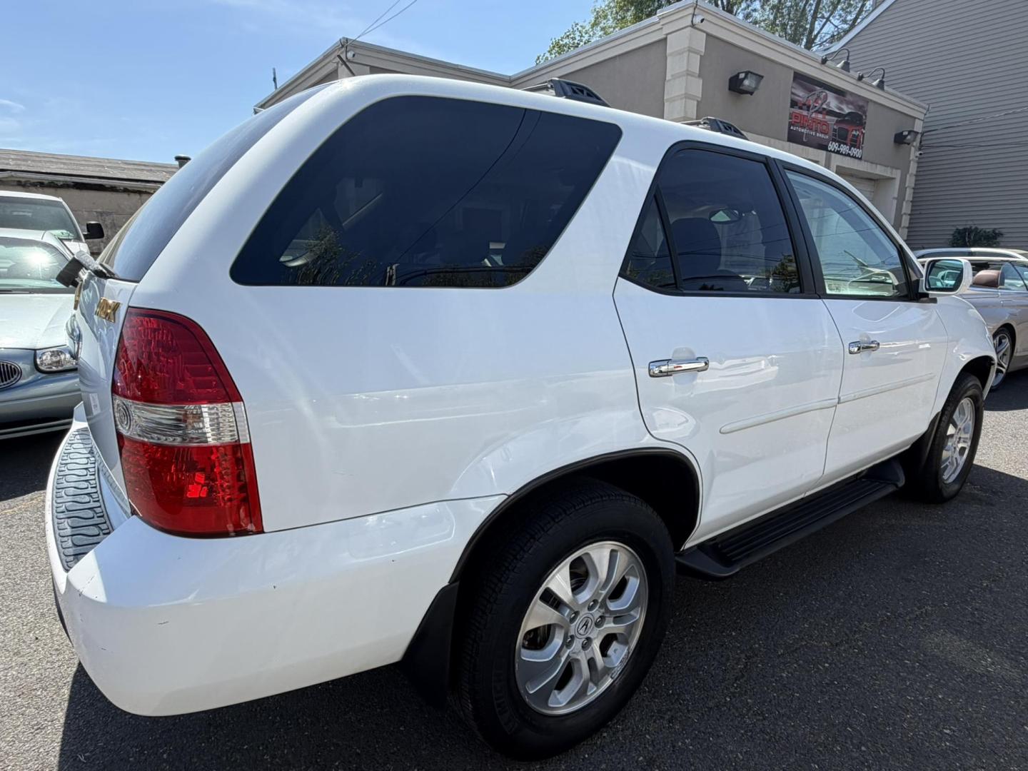 2003 White /Tan Leather Acura MDX Touring with Rear DVD System (2HNYD18733H) with an 3.5L V6 SOHC 24V engine, 5-Speed Automatic Overdrive transmission, located at 1018 Brunswick Ave, Trenton, NJ, 08638, (609) 989-0900, 40.240086, -74.748085 - This Touring model MDX is loaded up and super clean w so much great service history! You can buy this SUV w confidence. A great price for this reliable Acura. A must see and drive ASAP, please call Anthony to set up an appt. 609-273-5100 - Photo#5