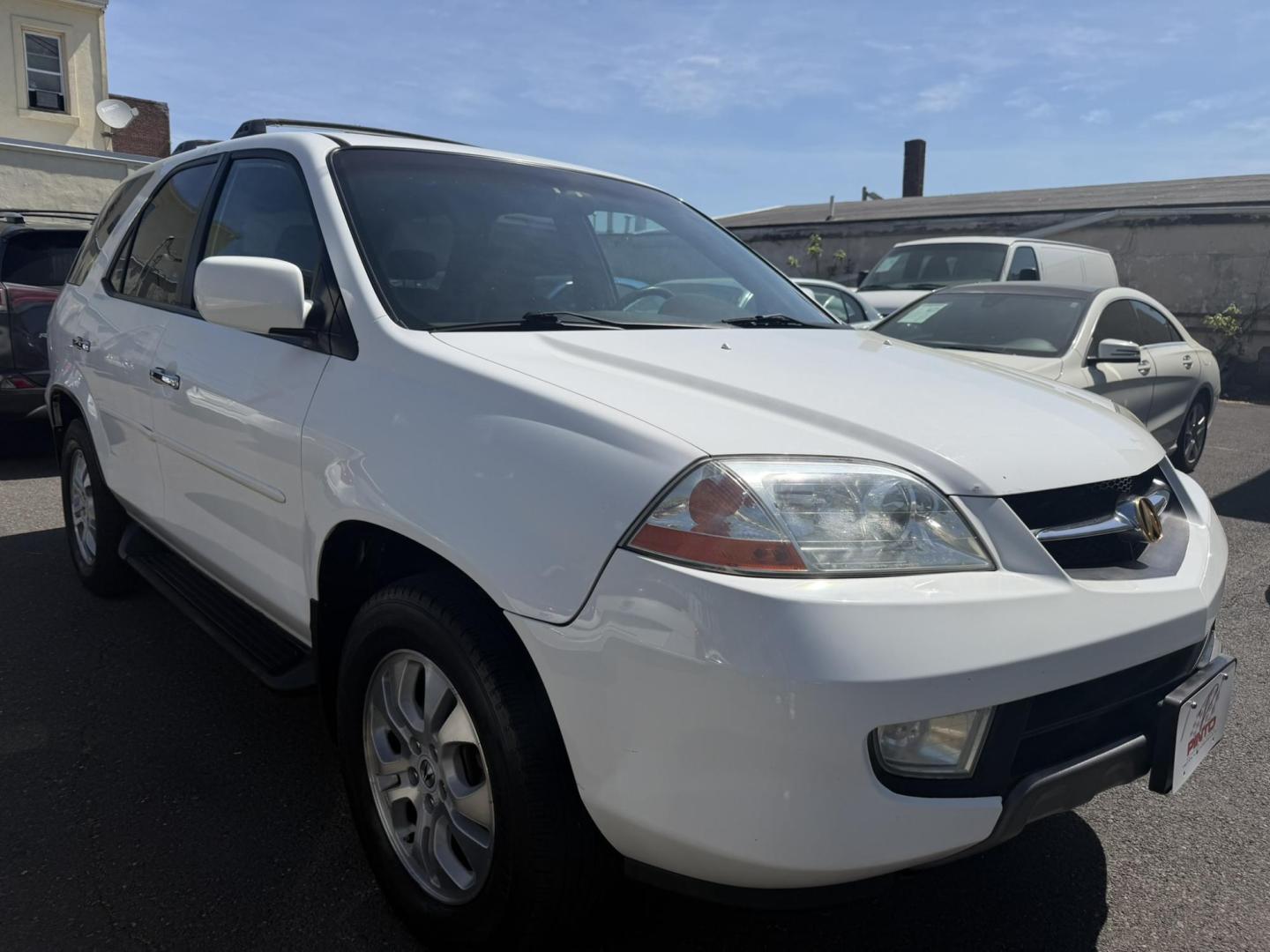 2003 White /Tan Leather Acura MDX Touring with Rear DVD System (2HNYD18733H) with an 3.5L V6 SOHC 24V engine, 5-Speed Automatic Overdrive transmission, located at 1018 Brunswick Ave, Trenton, NJ, 08638, (609) 989-0900, 40.240086, -74.748085 - This Touring model MDX is loaded up and super clean w so much great service history! You can buy this SUV w confidence. A great price for this reliable Acura. A must see and drive ASAP, please call Anthony to set up an appt. 609-273-5100 - Photo#0