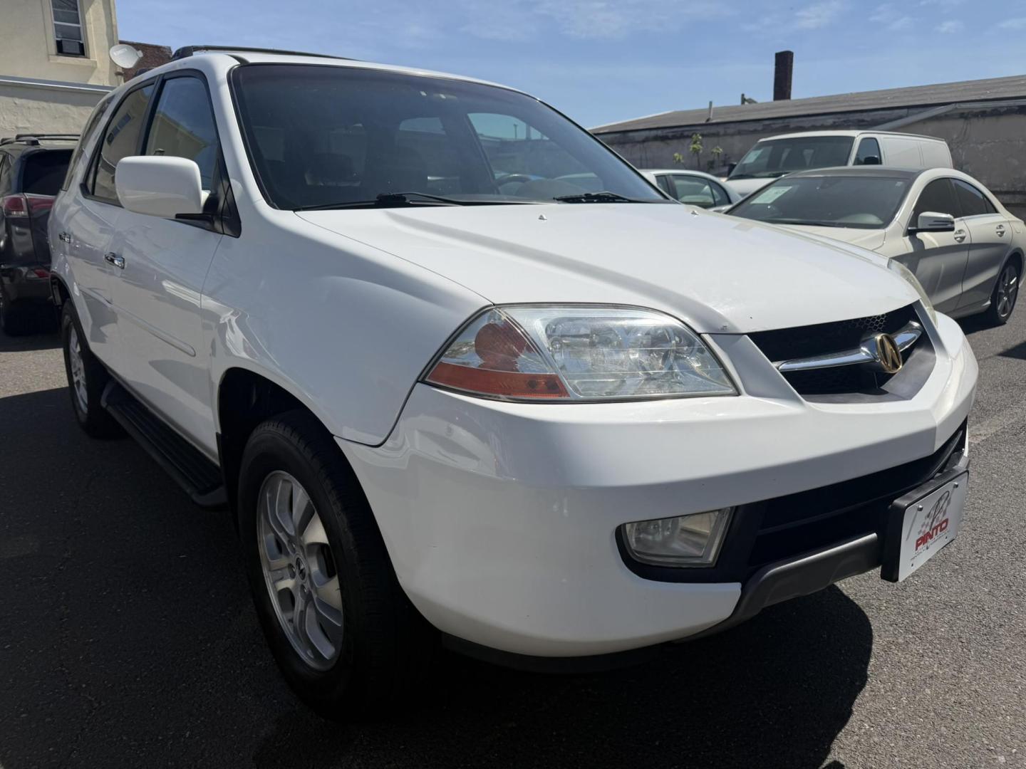 2003 White /Tan Leather Acura MDX Touring with Rear DVD System (2HNYD18733H) with an 3.5L V6 SOHC 24V engine, 5-Speed Automatic Overdrive transmission, located at 1018 Brunswick Ave, Trenton, NJ, 08638, (609) 989-0900, 40.240086, -74.748085 - This Touring model MDX is loaded up and super clean w so much great service history! You can buy this SUV w confidence. A great price for this reliable Acura. A must see and drive ASAP, please call Anthony to set up an appt. 609-273-5100 - Photo#12