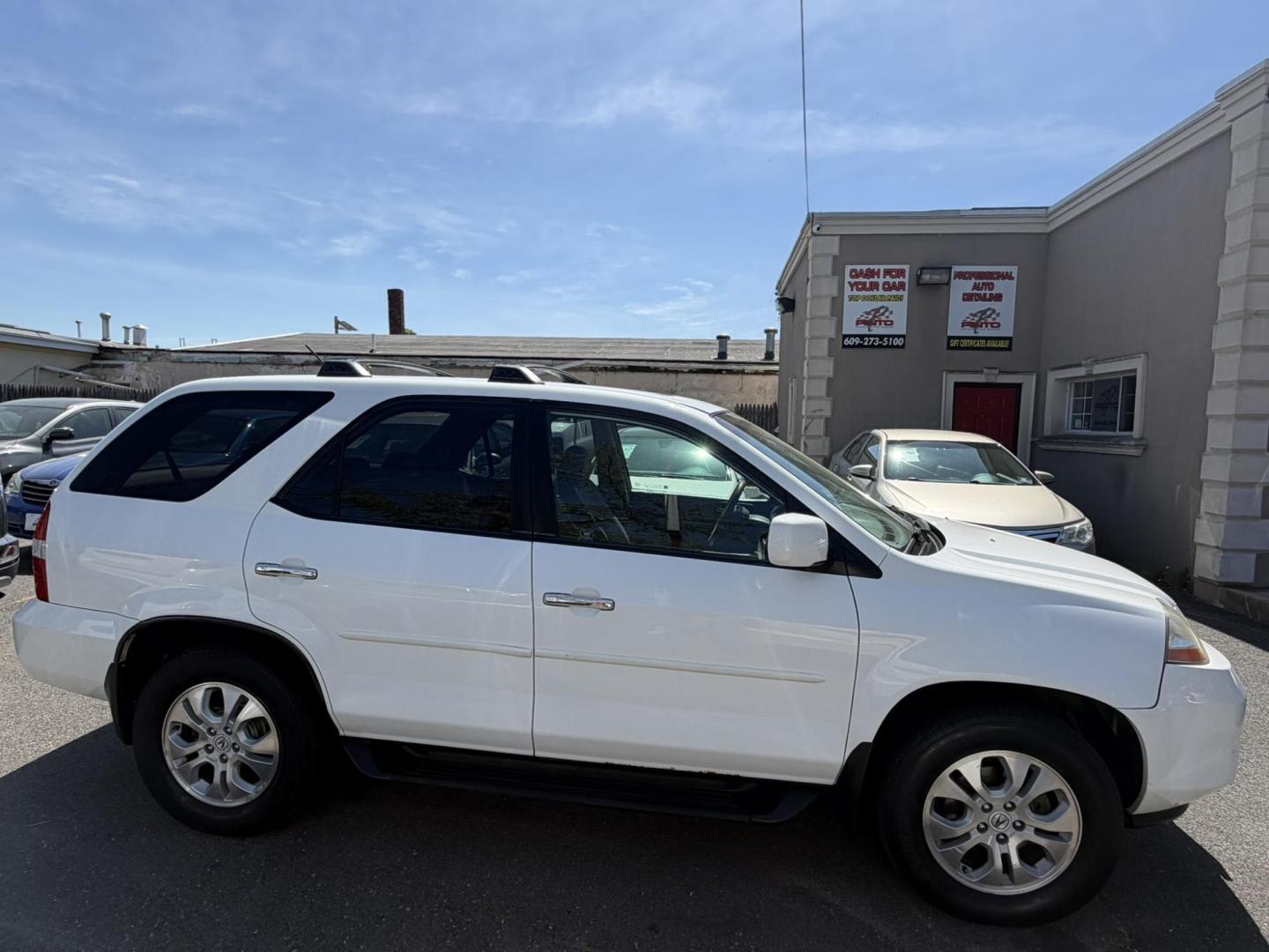 2003 White /Tan Leather Acura MDX Touring with Rear DVD System (2HNYD18733H) with an 3.5L V6 SOHC 24V engine, 5-Speed Automatic Overdrive transmission, located at 1018 Brunswick Ave, Trenton, NJ, 08638, (609) 989-0900, 40.240086, -74.748085 - This Touring model MDX is loaded up and super clean w so much great service history! You can buy this SUV w confidence. A great price for this reliable Acura. A must see and drive ASAP, please call Anthony to set up an appt. 609-273-5100 - Photo#13