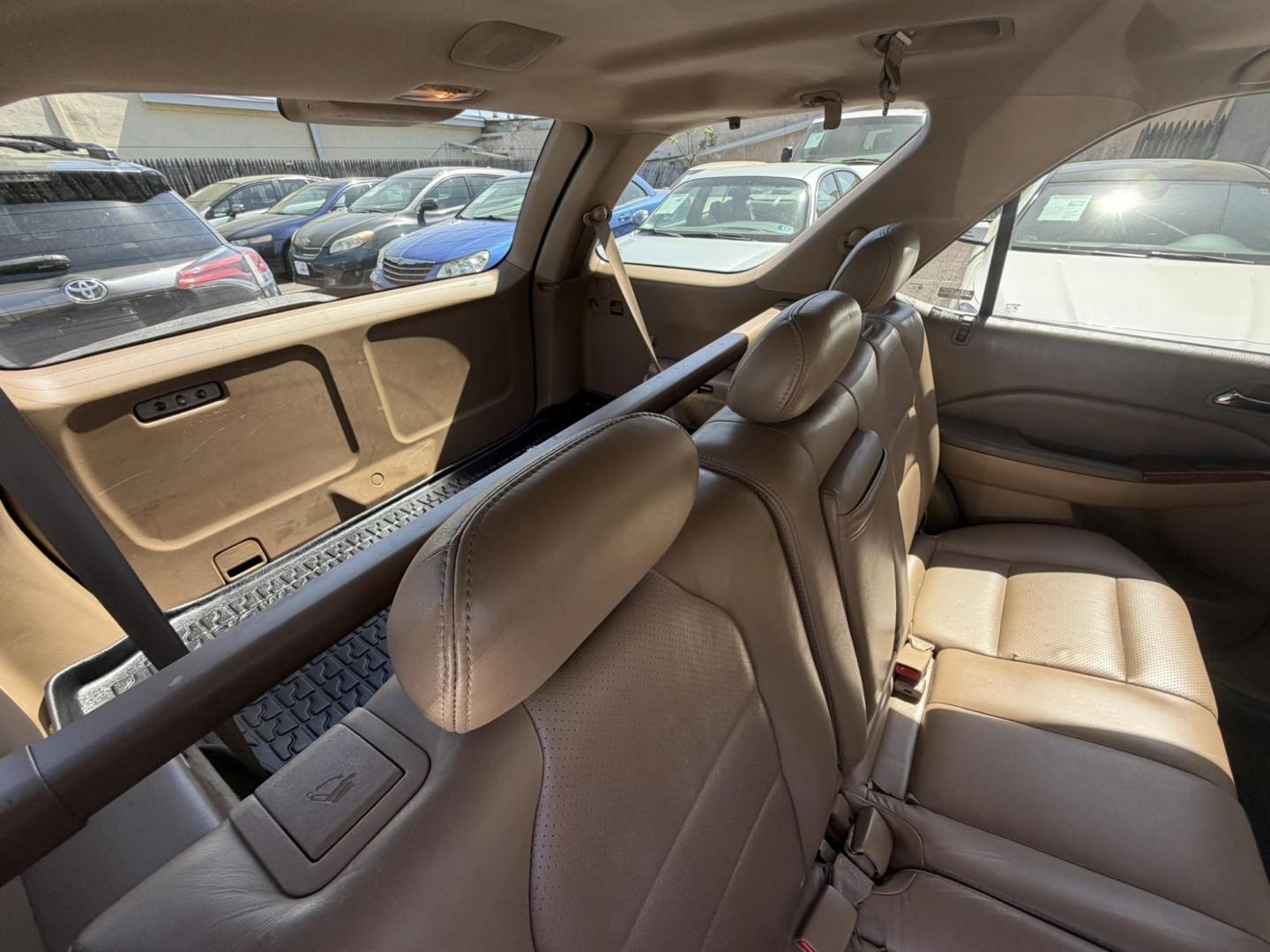 2003 White /Tan Leather Acura MDX Touring with Rear DVD System (2HNYD18733H) with an 3.5L V6 SOHC 24V engine, 5-Speed Automatic Overdrive transmission, located at 1018 Brunswick Ave, Trenton, NJ, 08638, (609) 989-0900, 40.240086, -74.748085 - This Touring model MDX is loaded up and super clean w so much great service history! You can buy this SUV w confidence. A great price for this reliable Acura. A must see and drive ASAP, please call Anthony to set up an appt. 609-273-5100 - Photo#19