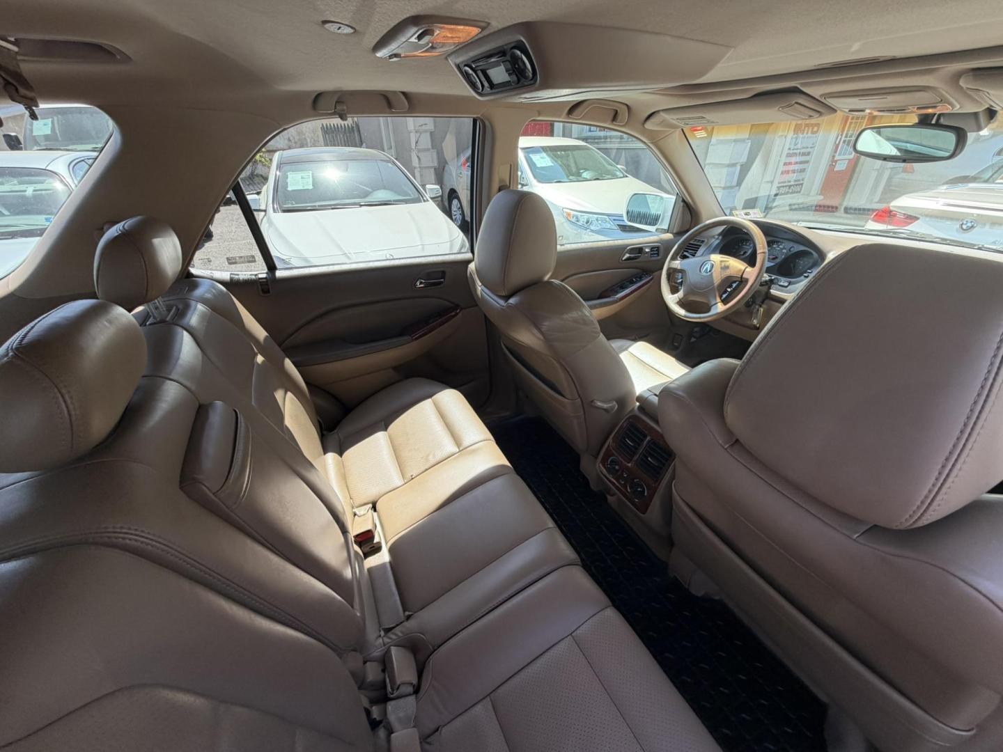 2003 White /Tan Leather Acura MDX Touring with Rear DVD System (2HNYD18733H) with an 3.5L V6 SOHC 24V engine, 5-Speed Automatic Overdrive transmission, located at 1018 Brunswick Ave, Trenton, NJ, 08638, (609) 989-0900, 40.240086, -74.748085 - This Touring model MDX is loaded up and super clean w so much great service history! You can buy this SUV w confidence. A great price for this reliable Acura. A must see and drive ASAP, please call Anthony to set up an appt. 609-273-5100 - Photo#20