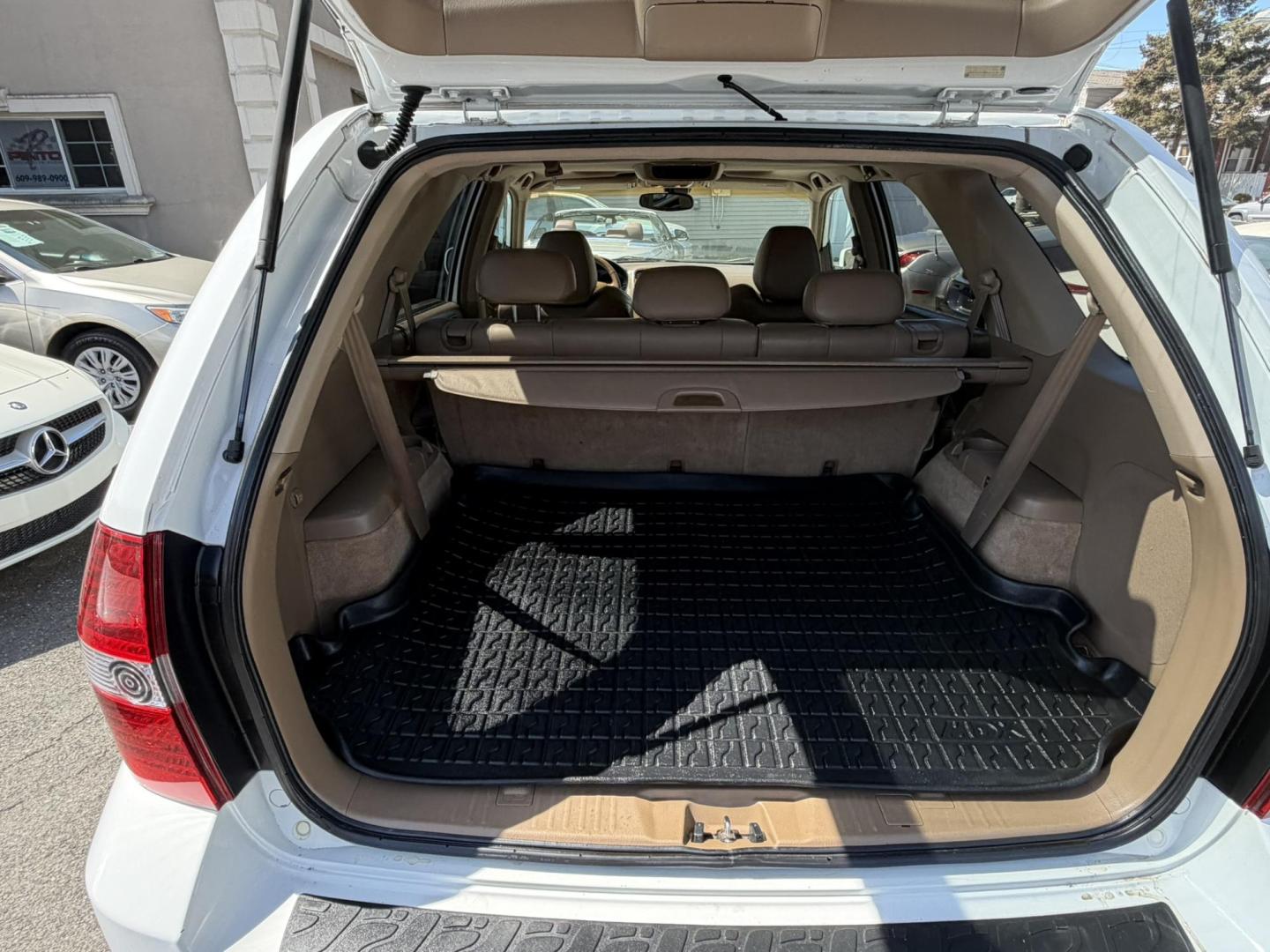 2003 White /Tan Leather Acura MDX Touring with Rear DVD System (2HNYD18733H) with an 3.5L V6 SOHC 24V engine, 5-Speed Automatic Overdrive transmission, located at 1018 Brunswick Ave, Trenton, NJ, 08638, (609) 989-0900, 40.240086, -74.748085 - This Touring model MDX is loaded up and super clean w so much great service history! You can buy this SUV w confidence. A great price for this reliable Acura. A must see and drive ASAP, please call Anthony to set up an appt. 609-273-5100 - Photo#37