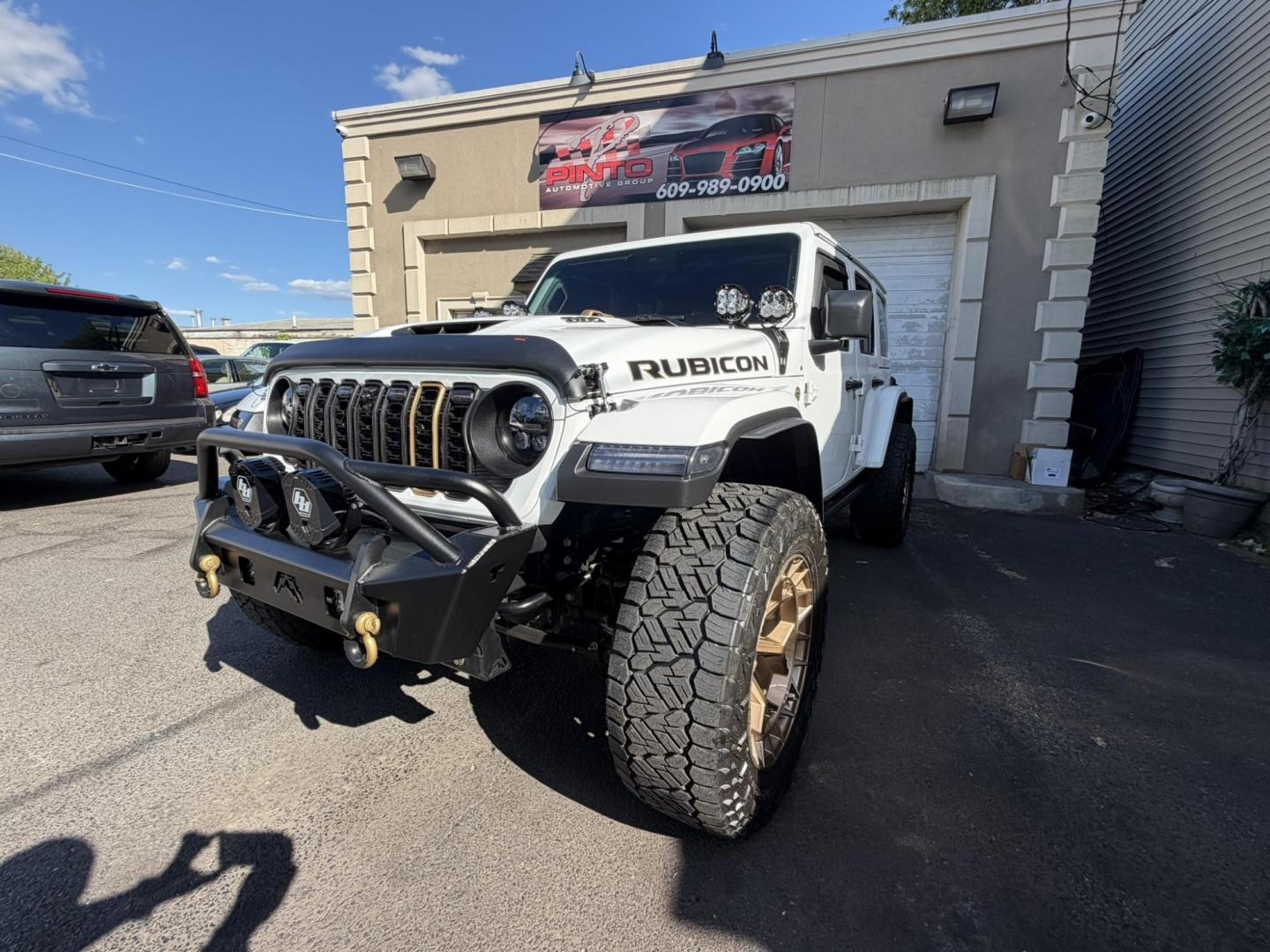 2024 White /Red Jeep Wrangler Rubicon 392 (1C4RJXSJ4RW) with an 6.4L V8 DOHC 32V engine, 6M transmission, located at 1018 Brunswick Ave, Trenton, NJ, 08638, (609) 989-0900, 40.240086, -74.748085 - WOW! WOW! WOW! This Rubicon is one Badass Jeep! Loaded w options and close to $20k in custom upgrades including LED Baja Design Lights, Borla exhaust, 20" Fuel wheels on 37" tires, custom front bumper and power dropdown running boards! This Jeep has been fully ceramic coated and tinted w/ windshield - Photo#7