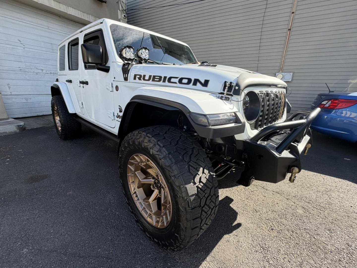 2024 White /Red Jeep Wrangler Rubicon 392 (1C4RJXSJ4RW) with an 6.4L V8 DOHC 32V engine, 6M transmission, located at 1018 Brunswick Ave, Trenton, NJ, 08638, (609) 989-0900, 40.240086, -74.748085 - WOW! WOW! WOW! This Rubicon is one Badass Jeep! Loaded w options and close to $20k in custom upgrades including LED Baja Design Lights, Borla exhaust, 20" Fuel wheels on 37" tires, custom front bumper and power dropdown running boards! This Jeep has been fully ceramic coated and tinted w/ windshield - Photo#10