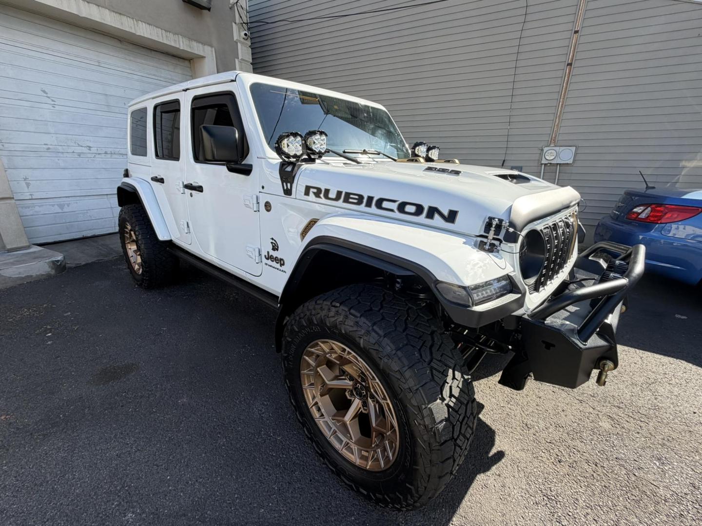 2024 White /Red Jeep Wrangler Rubicon 392 (1C4RJXSJ4RW) with an 6.4L V8 DOHC 32V engine, 6M transmission, located at 1018 Brunswick Ave, Trenton, NJ, 08638, (609) 989-0900, 40.240086, -74.748085 - WOW! WOW! WOW! This Rubicon is one Badass Jeep! Loaded w options and close to $20k in custom upgrades including LED Baja Design Lights, Borla exhaust, 20" Fuel wheels on 37" tires, custom front bumper and power dropdown running boards! This Jeep has been fully ceramic coated and tinted w/ windshield - Photo#12
