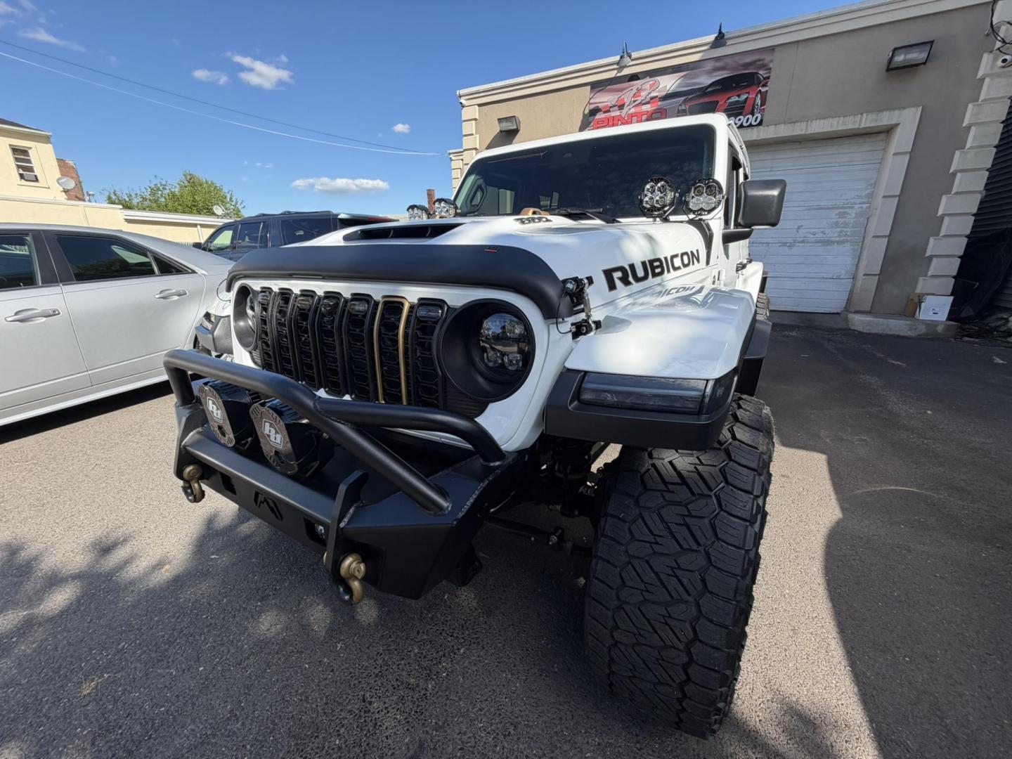 2024 White /Red Jeep Wrangler Rubicon 392 (1C4RJXSJ4RW) with an 6.4L V8 DOHC 32V engine, 6M transmission, located at 1018 Brunswick Ave, Trenton, NJ, 08638, (609) 989-0900, 40.240086, -74.748085 - WOW! WOW! WOW! This Rubicon is one Badass Jeep! Loaded w options and close to $20k in custom upgrades including LED Baja Design Lights, Borla exhaust, 20" Fuel wheels on 37" tires, custom front bumper and power dropdown running boards! This Jeep has been fully ceramic coated and tinted w/ windshield - Photo#15
