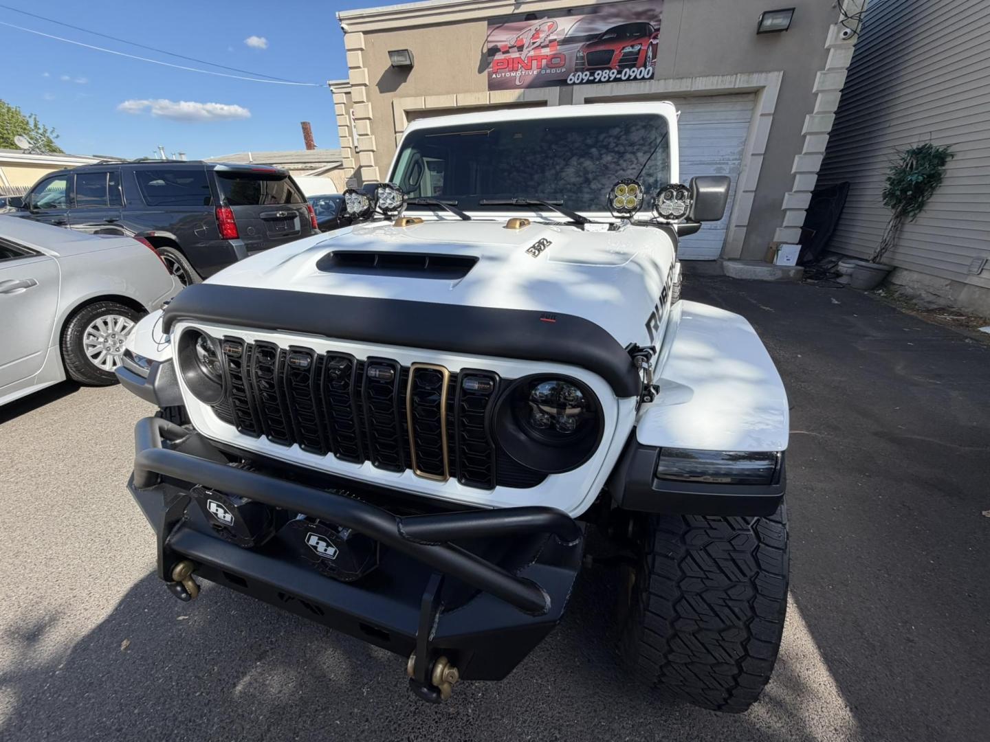 2024 White /Red Jeep Wrangler Rubicon 392 (1C4RJXSJ4RW) with an 6.4L V8 DOHC 32V engine, 6M transmission, located at 1018 Brunswick Ave, Trenton, NJ, 08638, (609) 989-0900, 40.240086, -74.748085 - WOW! WOW! WOW! This Rubicon is one Badass Jeep! Loaded w options and close to $20k in custom upgrades including LED Baja Design Lights, Borla exhaust, 20" Fuel wheels on 37" tires, custom front bumper and power dropdown running boards! This Jeep has been fully ceramic coated and tinted w/ windshield - Photo#16