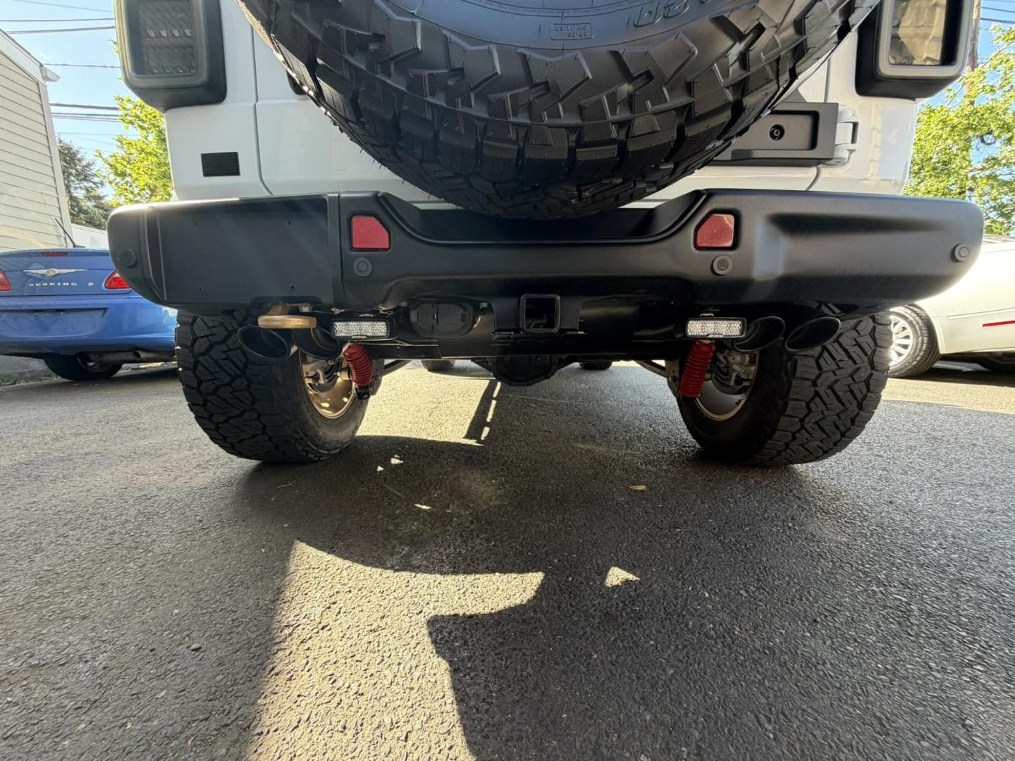 2024 White /Red Jeep Wrangler Rubicon 392 (1C4RJXSJ4RW) with an 6.4L V8 DOHC 32V engine, 6M transmission, located at 1018 Brunswick Ave, Trenton, NJ, 08638, (609) 989-0900, 40.240086, -74.748085 - WOW! WOW! WOW! This Rubicon is one Badass Jeep! Loaded w options and close to $20k in custom upgrades including LED Baja Design Lights, Borla exhaust, 20" Fuel wheels on 37" tires, custom front bumper and power dropdown running boards! This Jeep has been fully ceramic coated and tinted w/ windshield - Photo#23