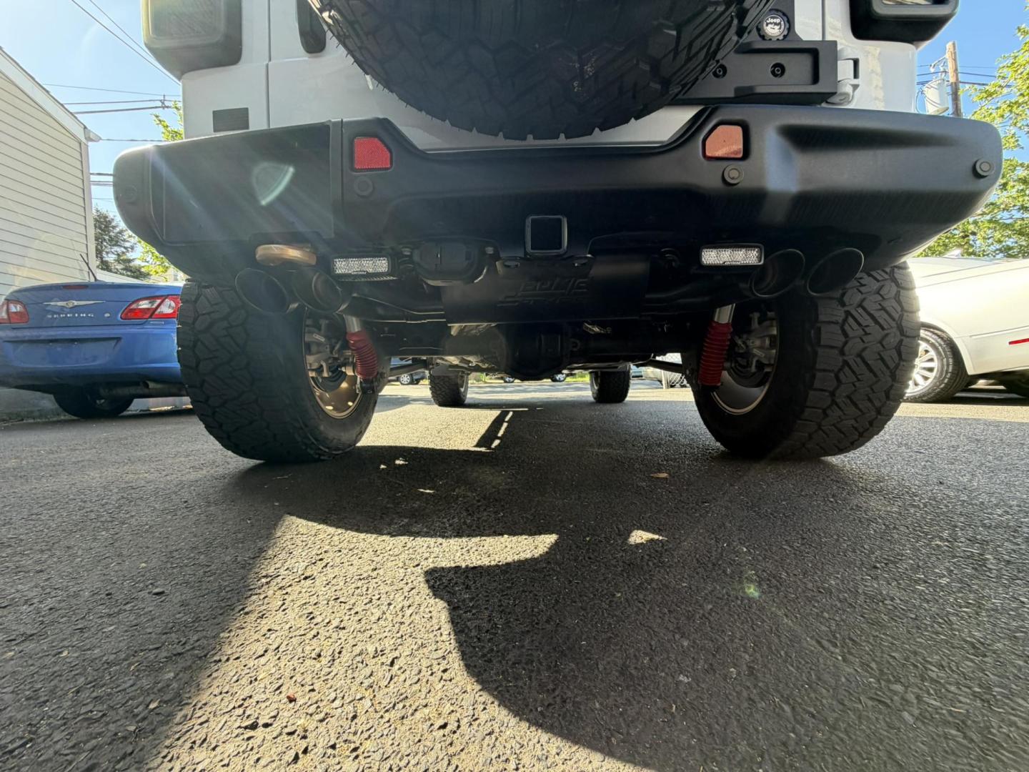 2024 White /Red Jeep Wrangler Rubicon 392 (1C4RJXSJ4RW) with an 6.4L V8 DOHC 32V engine, 6M transmission, located at 1018 Brunswick Ave, Trenton, NJ, 08638, (609) 989-0900, 40.240086, -74.748085 - WOW! WOW! WOW! This Rubicon is one Badass Jeep! Loaded w options and close to $20k in custom upgrades including LED Baja Design Lights, Borla exhaust, 20" Fuel wheels on 37" tires, custom front bumper and power dropdown running boards! This Jeep has been fully ceramic coated and tinted w/ windshield - Photo#24