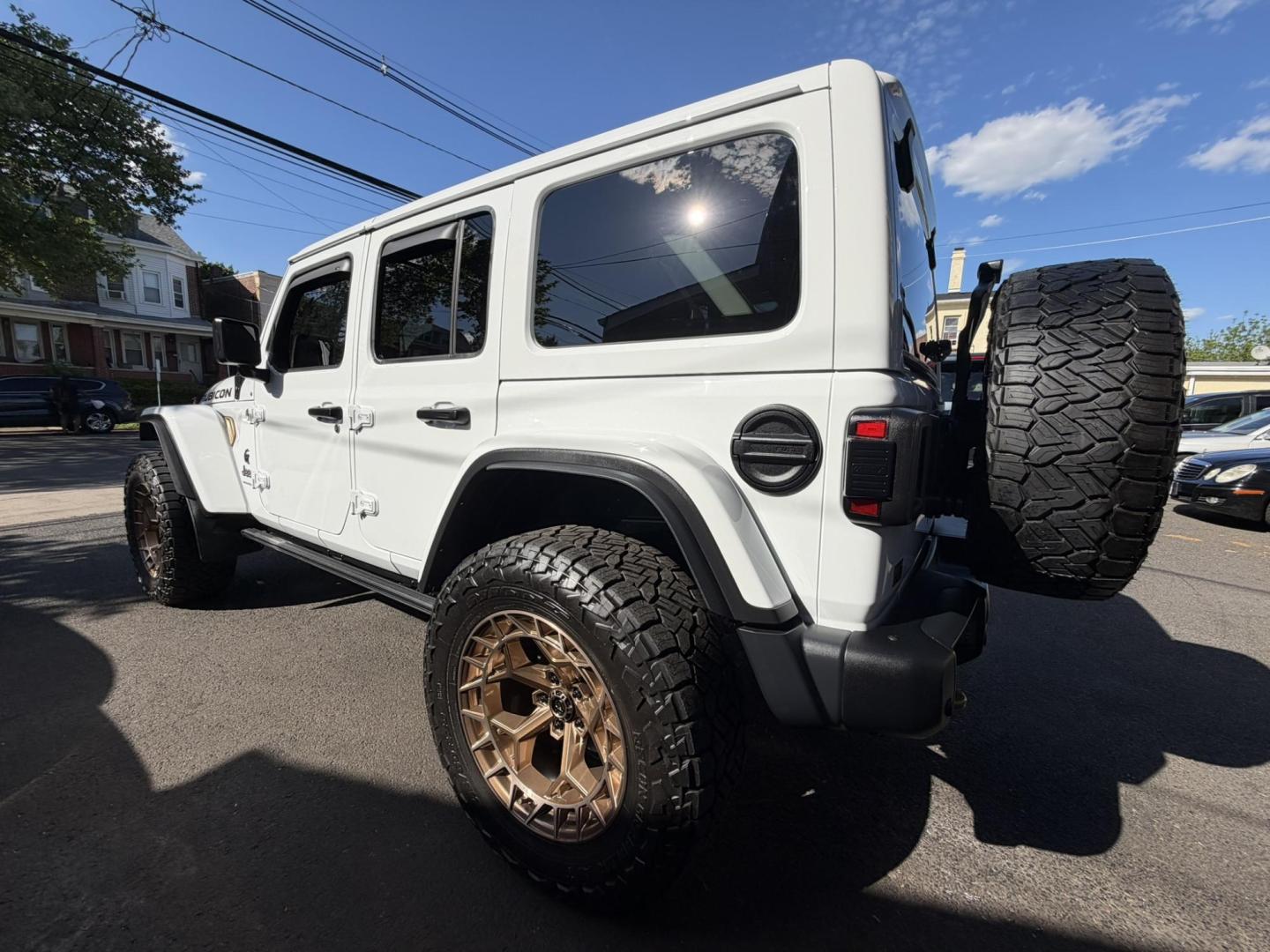 2024 White /Red Jeep Wrangler Rubicon 392 (1C4RJXSJ4RW) with an 6.4L V8 DOHC 32V engine, 6M transmission, located at 1018 Brunswick Ave, Trenton, NJ, 08638, (609) 989-0900, 40.240086, -74.748085 - WOW! WOW! WOW! This Rubicon is one Badass Jeep! Loaded w options and close to $20k in custom upgrades including LED Baja Design Lights, Borla exhaust, 20" Fuel wheels on 37" tires, custom front bumper and power dropdown running boards! This Jeep has been fully ceramic coated and tinted w/ windshield - Photo#27