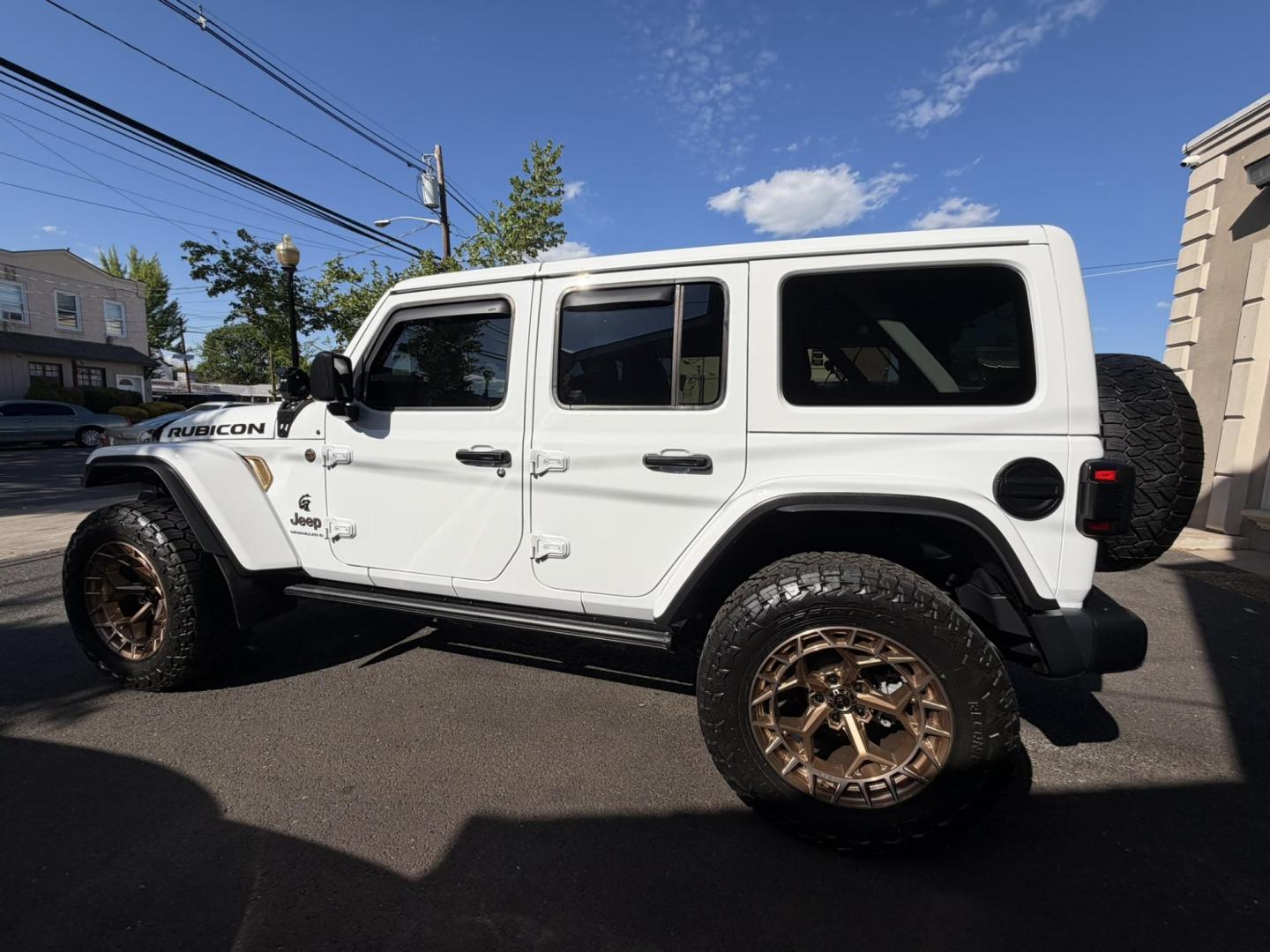 2024 White /Red Jeep Wrangler Rubicon 392 (1C4RJXSJ4RW) with an 6.4L V8 DOHC 32V engine, 6M transmission, located at 1018 Brunswick Ave, Trenton, NJ, 08638, (609) 989-0900, 40.240086, -74.748085 - WOW! WOW! WOW! This Rubicon is one Badass Jeep! Loaded w options and close to $20k in custom upgrades including LED Baja Design Lights, Borla exhaust, 20" Fuel wheels on 37" tires, custom front bumper and power dropdown running boards! This Jeep has been fully ceramic coated and tinted w/ windshield - Photo#28
