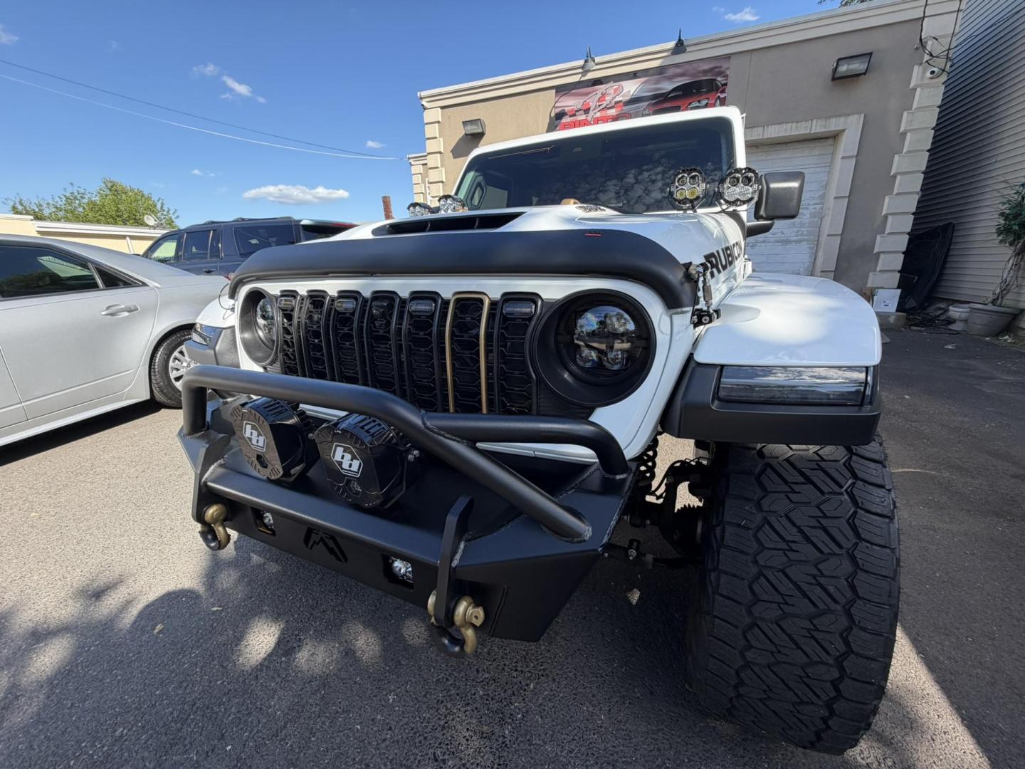 2024 White /Red Jeep Wrangler Rubicon 392 (1C4RJXSJ4RW) with an 6.4L V8 DOHC 32V engine, 6M transmission, located at 1018 Brunswick Ave, Trenton, NJ, 08638, (609) 989-0900, 40.240086, -74.748085 - WOW! WOW! WOW! This Rubicon is one Badass Jeep! Loaded w options and close to $20k in custom upgrades including LED Baja Design Lights, Borla exhaust, 20" Fuel wheels on 37" tires, custom front bumper and power dropdown running boards! This Jeep has been fully ceramic coated and tinted w/ windshield - Photo#31