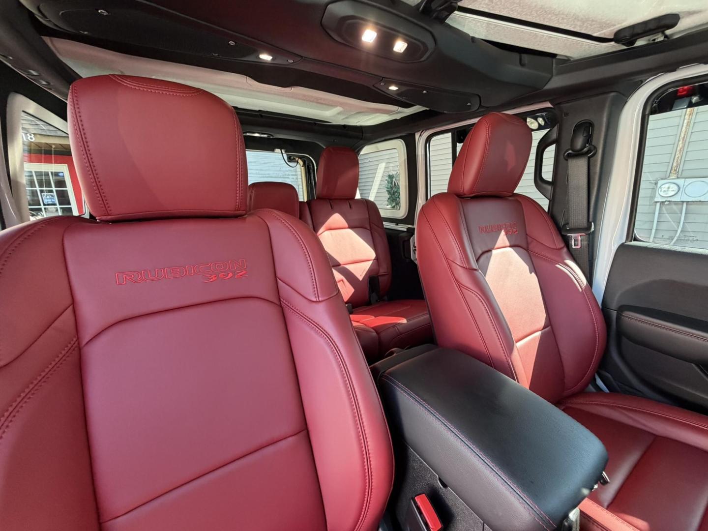 2024 White /Red Jeep Wrangler Rubicon 392 (1C4RJXSJ4RW) with an 6.4L V8 DOHC 32V engine, 6M transmission, located at 1018 Brunswick Ave, Trenton, NJ, 08638, (609) 989-0900, 40.240086, -74.748085 - WOW! WOW! WOW! This Rubicon is one Badass Jeep! Loaded w options and close to $20k in custom upgrades including LED Baja Design Lights, Borla exhaust, 20" Fuel wheels on 37" tires, custom front bumper and power dropdown running boards! This Jeep has been fully ceramic coated and tinted w/ windshield - Photo#35
