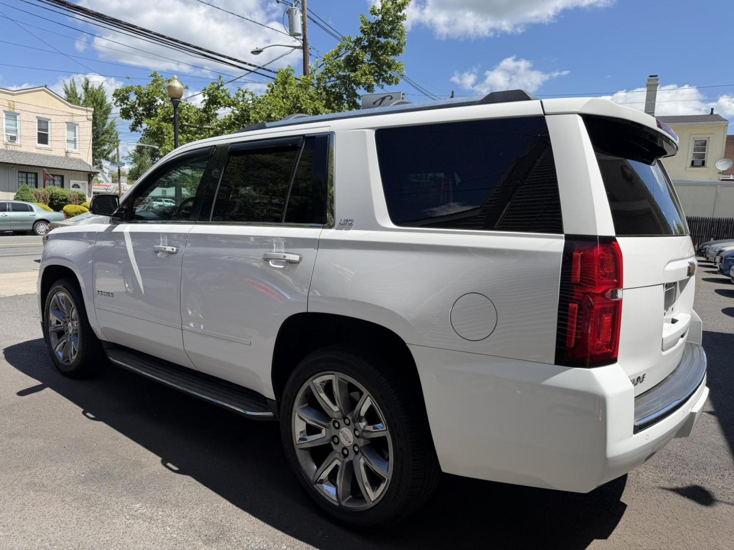 2015 White /Tan Chevrolet Tahoe LTZ 4WD (1GNSKCKC6FR) with an 5.3L V8 OHV 16V engine, 6-Speed Automatic transmission, located at 1018 Brunswick Ave, Trenton, NJ, 08638, (609) 989-0900, 40.240086, -74.748085 - Photo#1