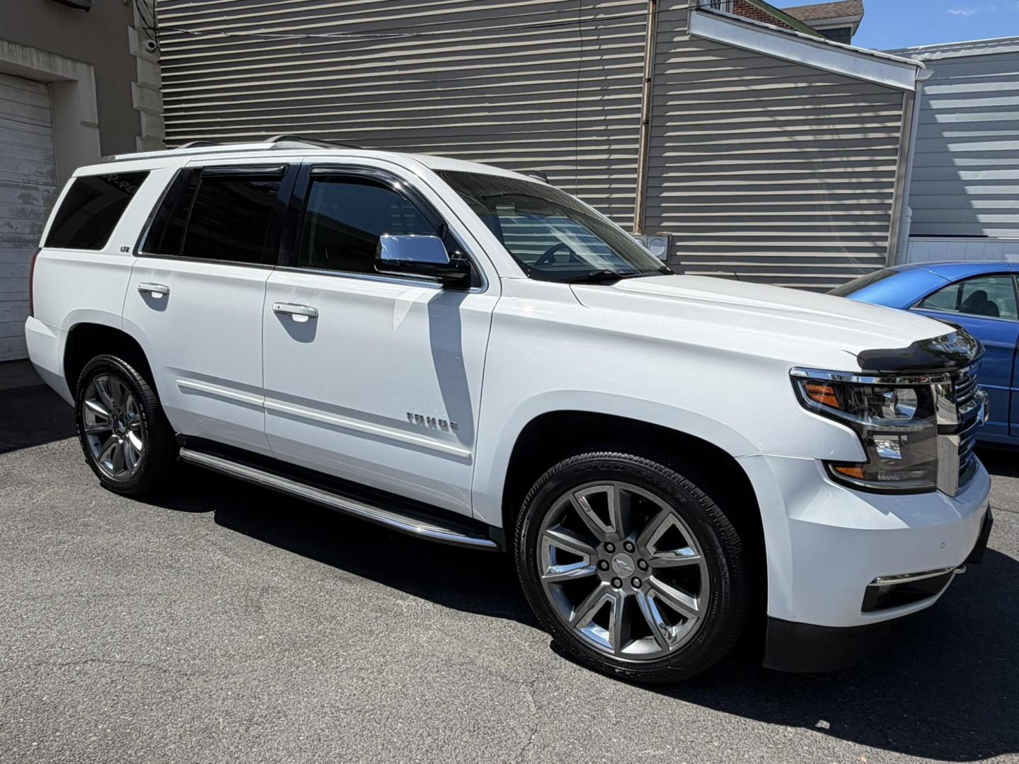 2015 White /Tan Chevrolet Tahoe LTZ 4WD (1GNSKCKC6FR) with an 5.3L V8 OHV 16V engine, 6-Speed Automatic transmission, located at 1018 Brunswick Ave, Trenton, NJ, 08638, (609) 989-0900, 40.240086, -74.748085 - Photo#6