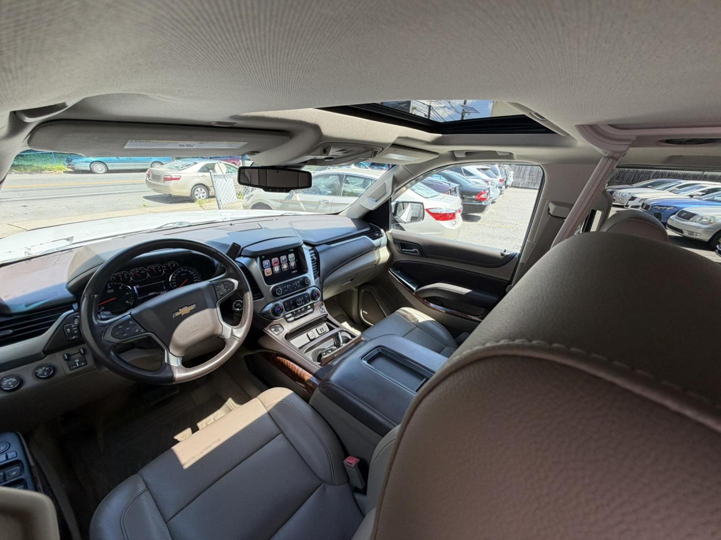 2015 White /Tan Chevrolet Tahoe LTZ 4WD (1GNSKCKC6FR) with an 5.3L V8 OHV 16V engine, 6-Speed Automatic transmission, located at 1018 Brunswick Ave, Trenton, NJ, 08638, (609) 989-0900, 40.240086, -74.748085 - Photo#15
