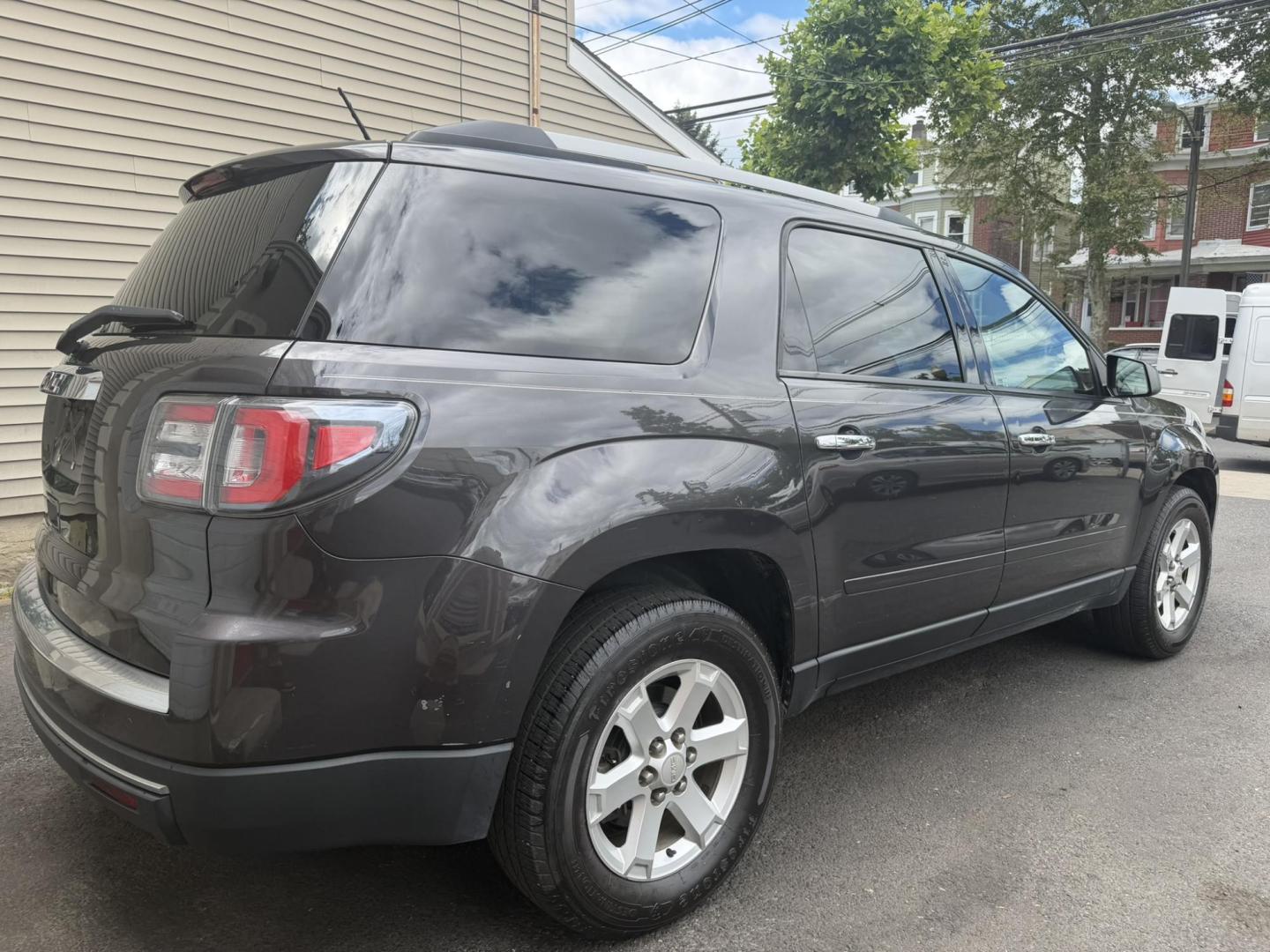 2015 GRAY /Black/gray GMC Acadia SLE-2 FWD (1GKKRPKD6FJ) with an 3.6L V6 DOHC 24V engine, 6-Speed Automatic transmission, located at 1018 Brunswick Ave, Trenton, NJ, 08638, (609) 989-0900, 40.240086, -74.748085 - This GMC is ready to go! Just serviced and detailed for the next owner. Sharp looking Acadia and must see and drive to appreciate. Call Anthony to set up an appointment, 609-273-5100 - Photo#4