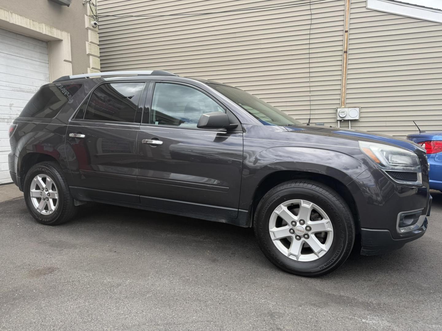 2015 GRAY /Black/gray GMC Acadia SLE-2 FWD (1GKKRPKD6FJ) with an 3.6L V6 DOHC 24V engine, 6-Speed Automatic transmission, located at 1018 Brunswick Ave, Trenton, NJ, 08638, (609) 989-0900, 40.240086, -74.748085 - This GMC is ready to go! Just serviced and detailed for the next owner. Sharp looking Acadia and must see and drive to appreciate. Call Anthony to set up an appointment, 609-273-5100 - Photo#12