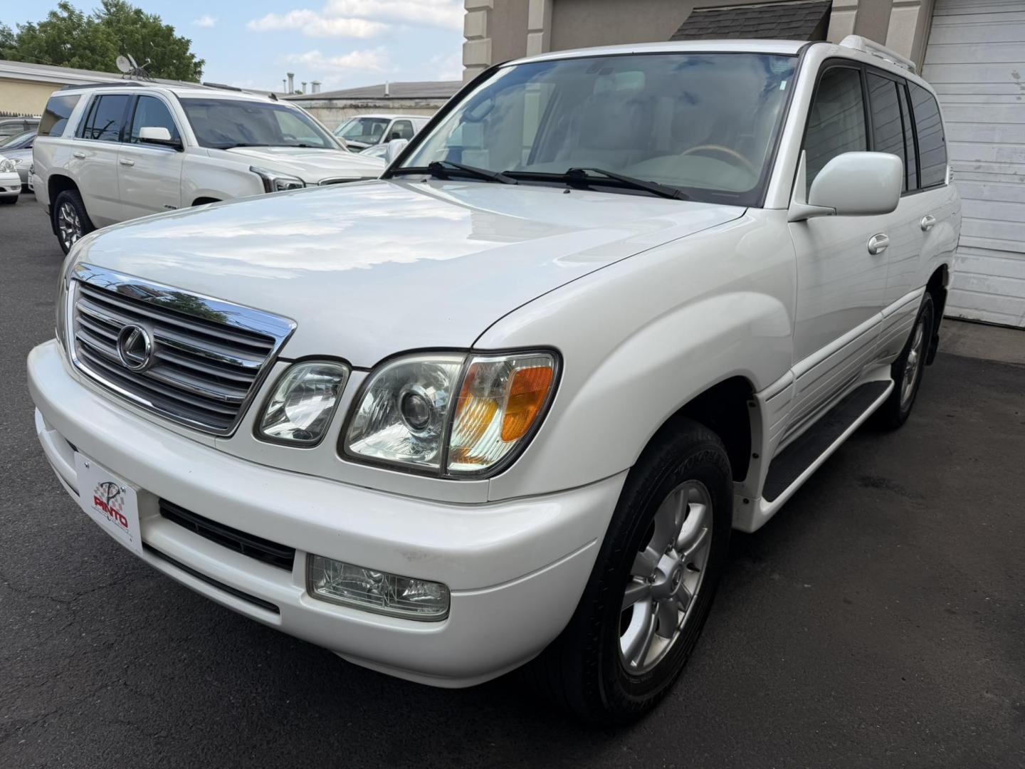 2004 White /Tan Leather Lexus LX 470 Sport Utility (JTJHT00W043) with an 4.7L V8 DOHC 32V engine, 5-Speed Automatic Overdrive transmission, located at 1018 Brunswick Ave, Trenton, NJ, 08638, (609) 989-0900, 40.240086, -74.748085 - Here is a really Rare 1 owner Lexus SUV! Freshly detailed and serviced and ready for another 100k or more miles! Lots of consistent service history on this LX470! Please call Anthony to set an appt. as this will not last long on the lot! 609-273-5100- Photo#2